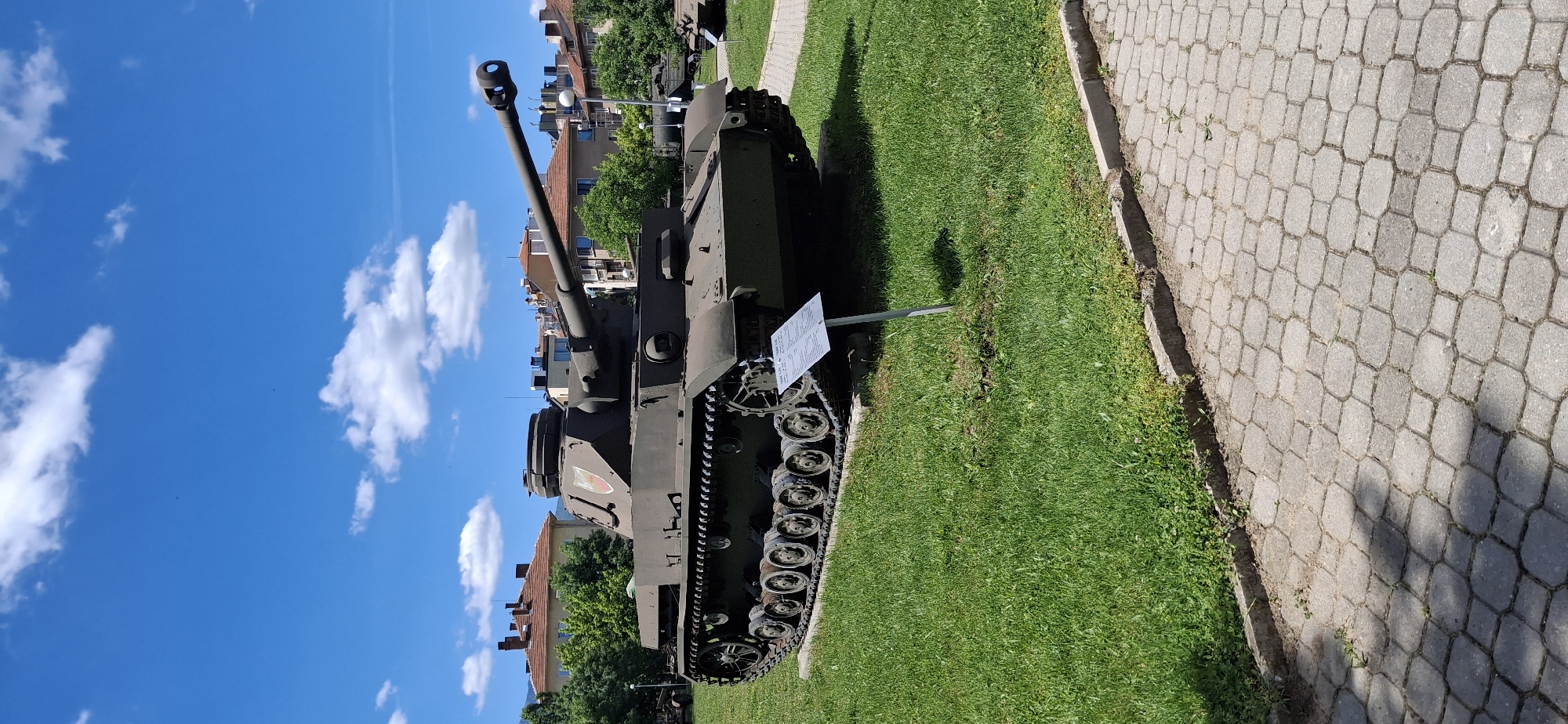 Military vehicles displayed at outdoor exhibit in Sofia