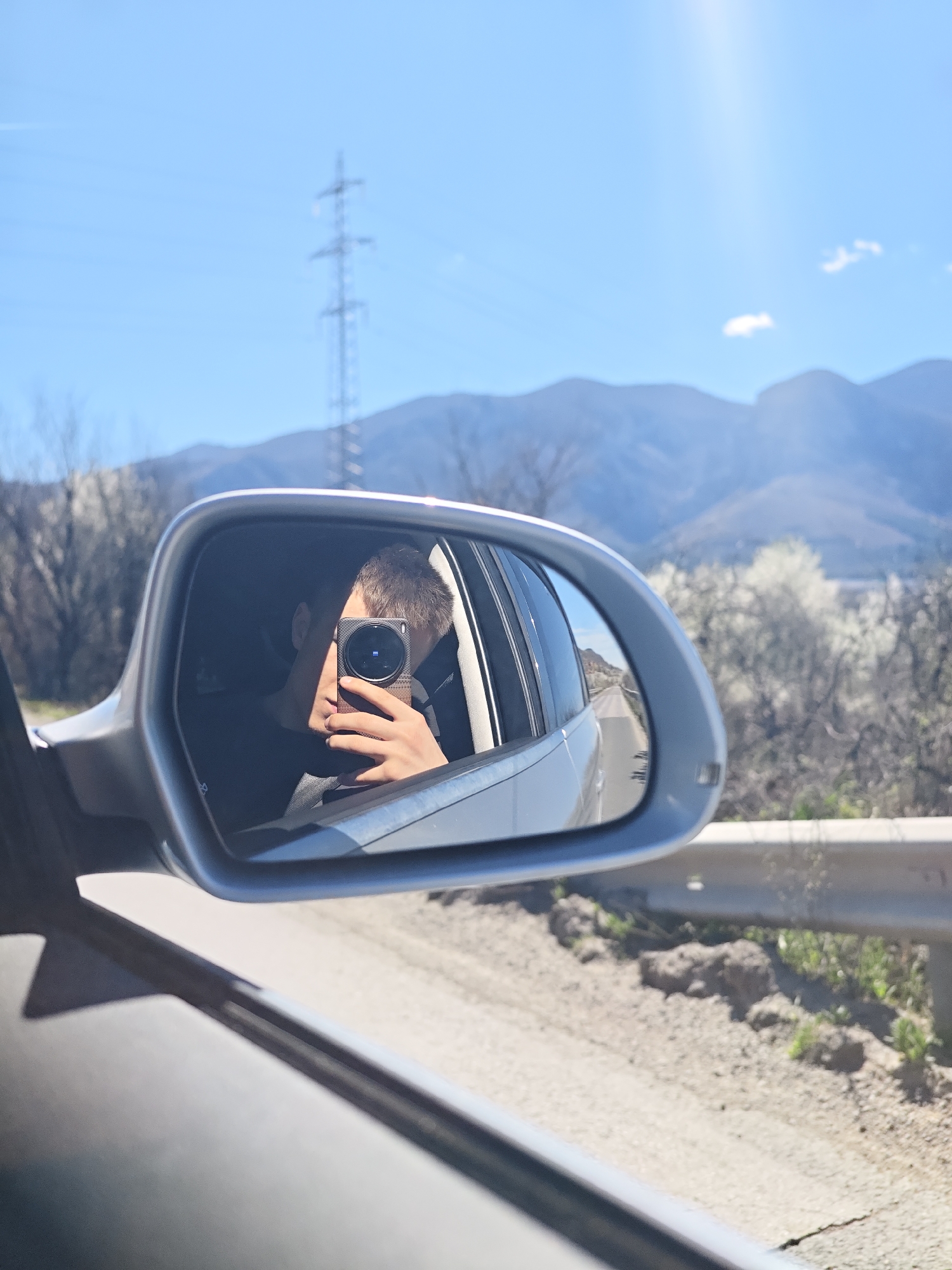Person takes mirror selfie in car near Vratsa mountains