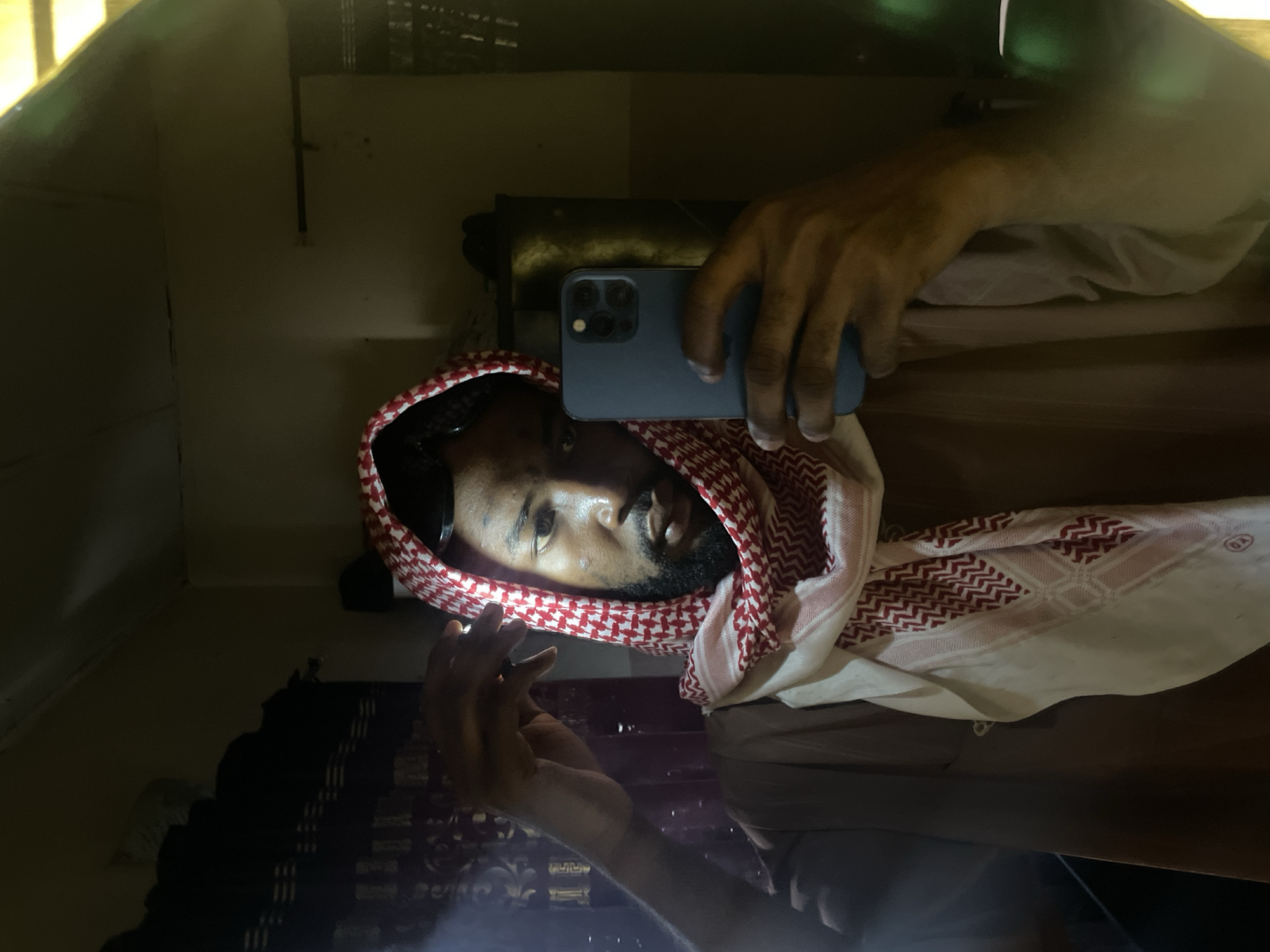 Man Takes Mirror Selfies in Lokoja, Nigeria