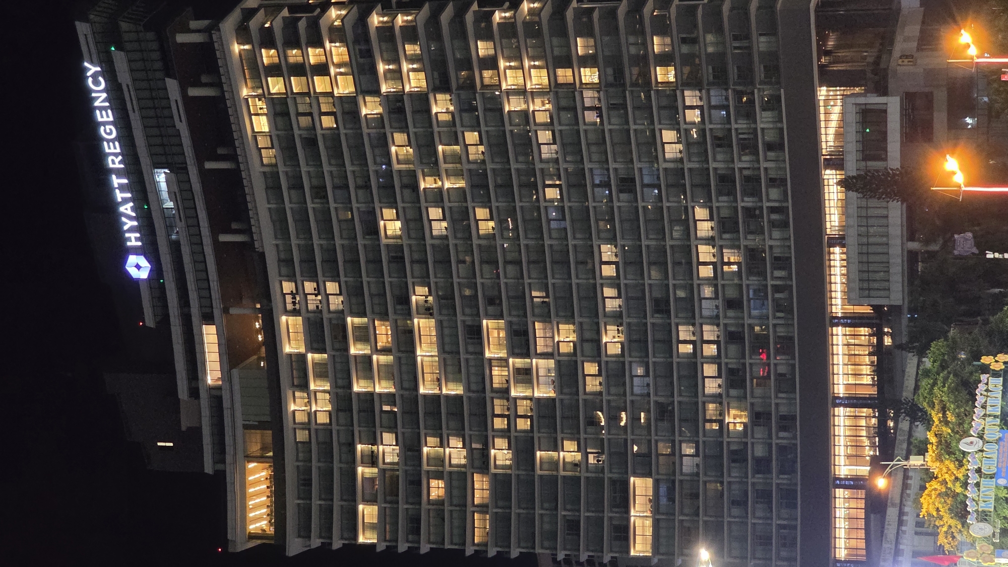 Nha Trang cityscape documented with illuminated Novotel hotel at night