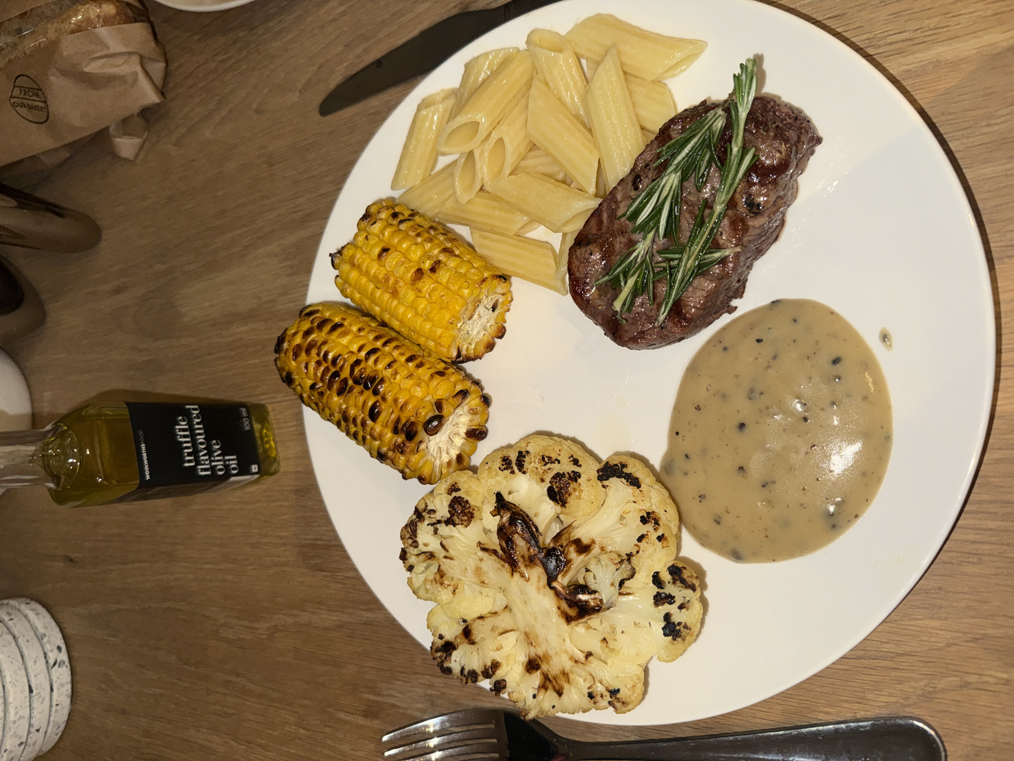 Cape Town resident grills steak dinner with vegetables