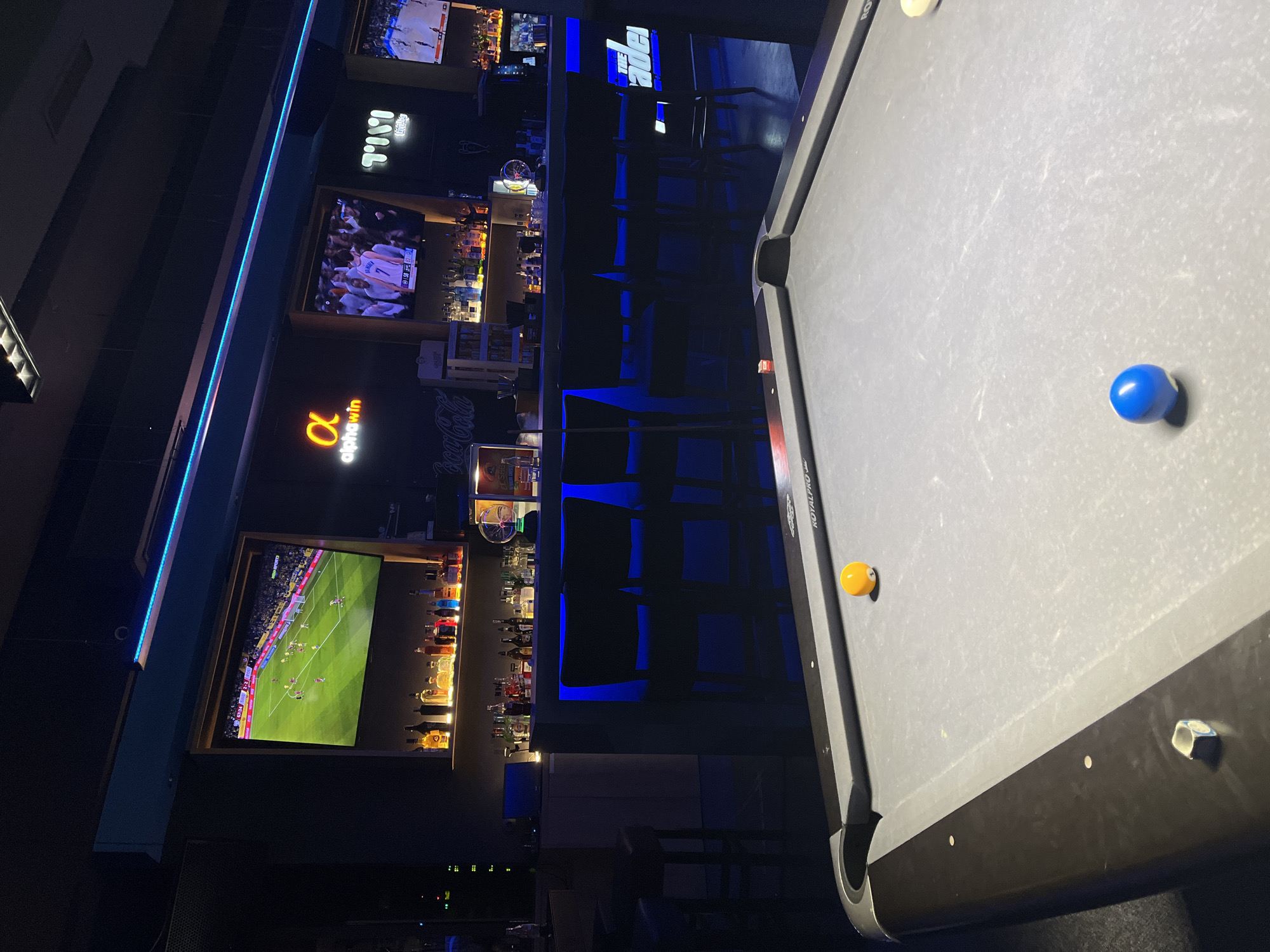 Bar interior with pool table captured in Sofia