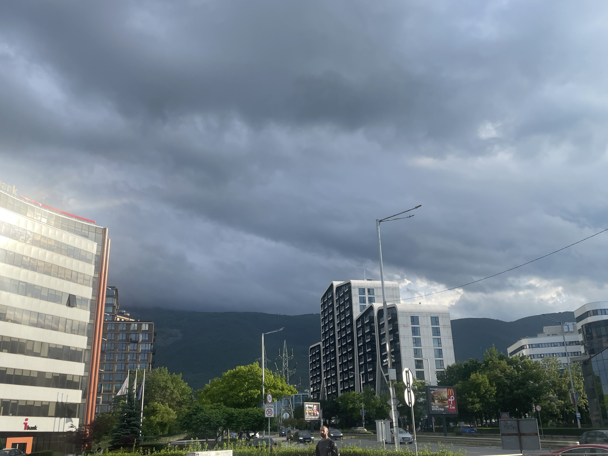 Dramatic skies captured over modern urban landscape