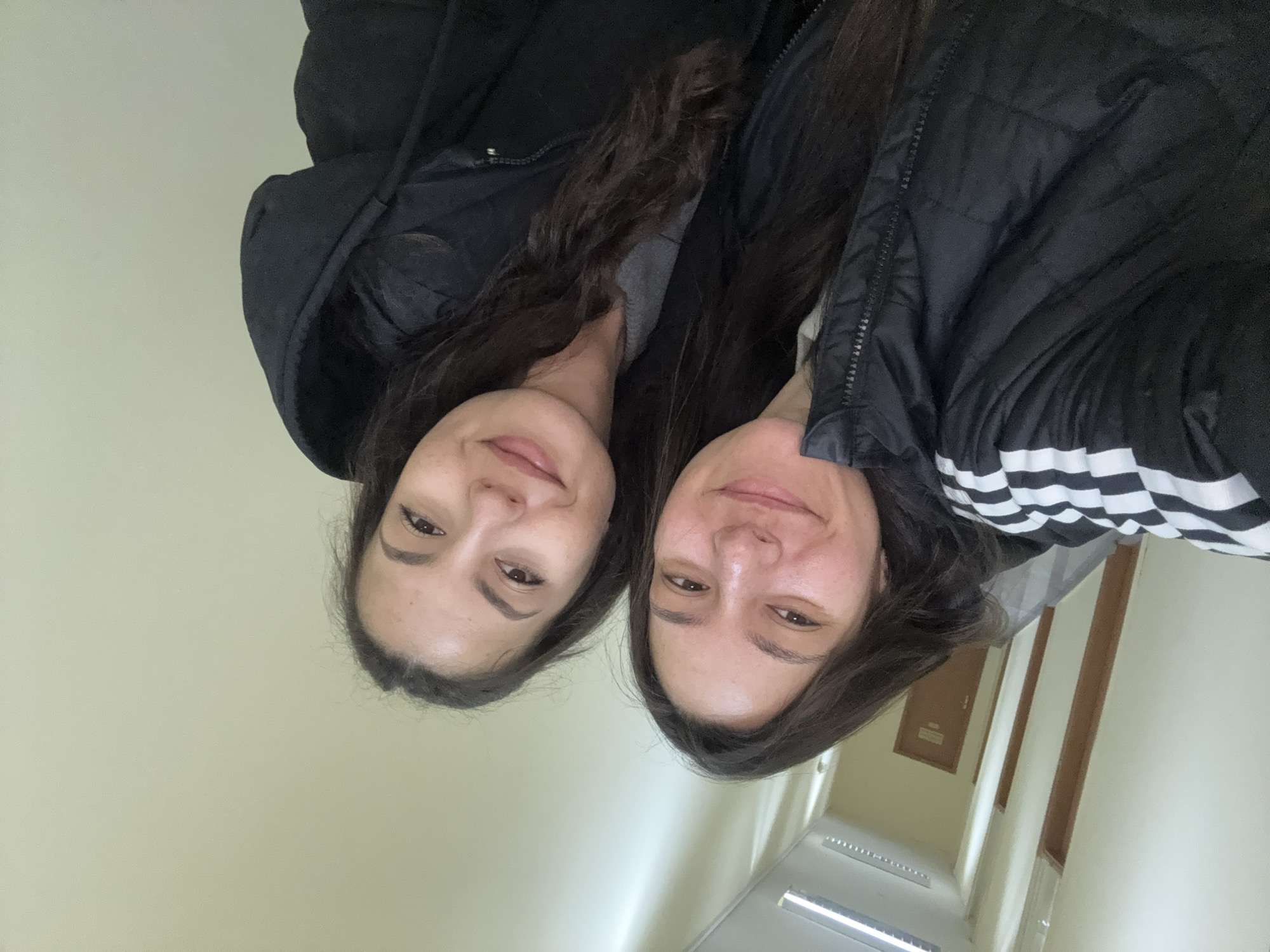 Two women take selfie in indoor hallway in Varna