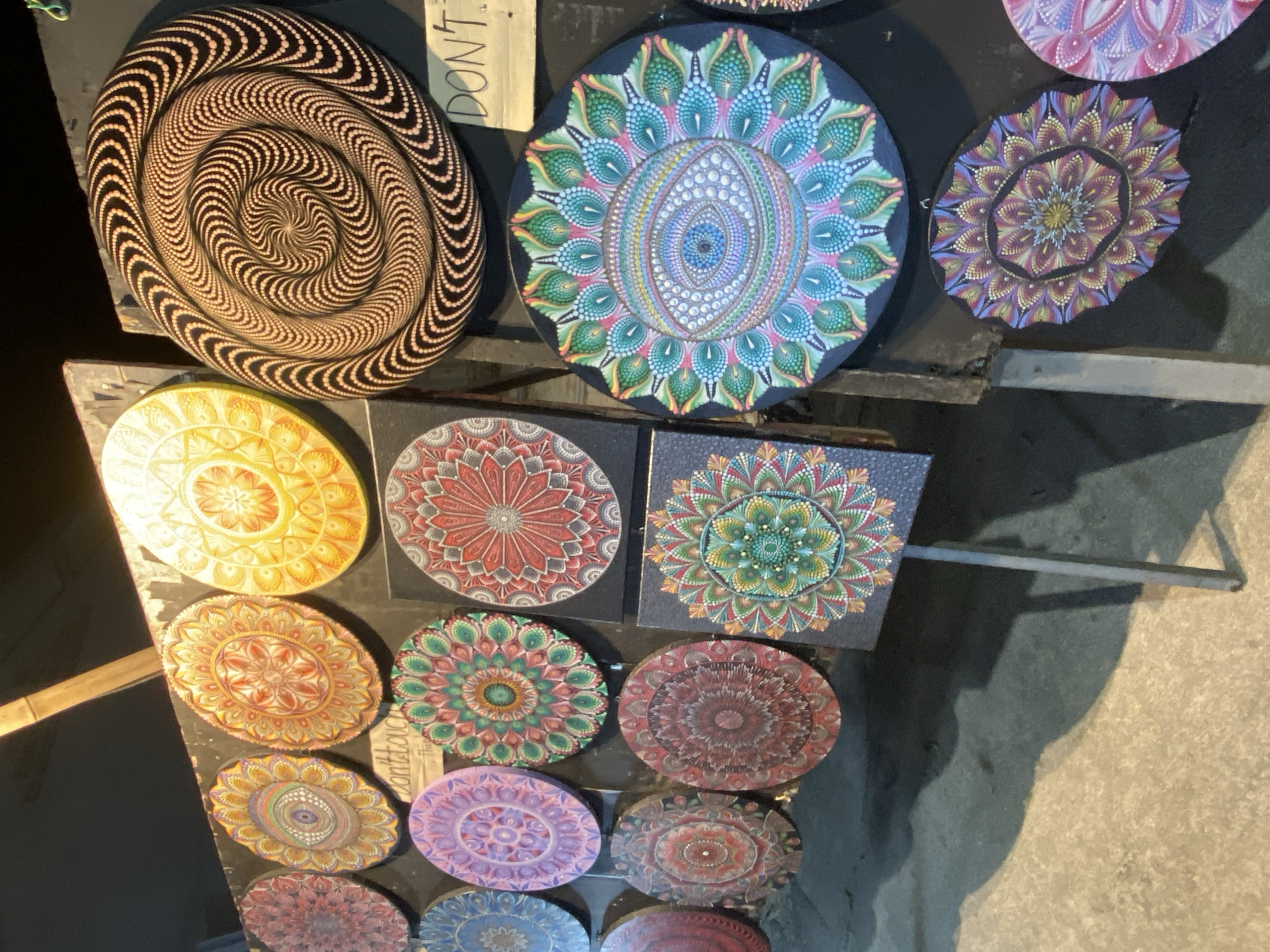Street vendors display art, plants, clothing in Baan Kai