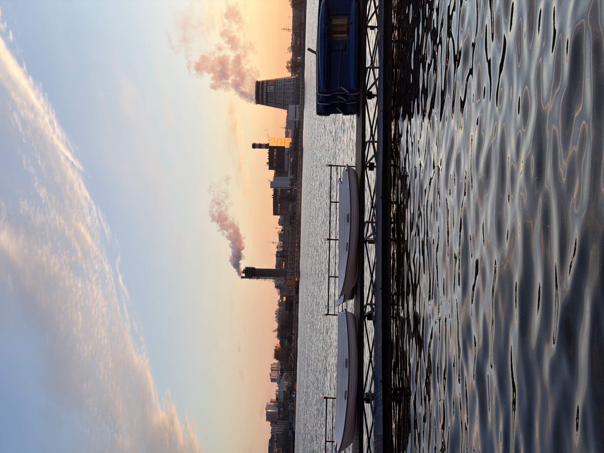 Golden hour sunset documented across Izhevsk waterfront and cityscape