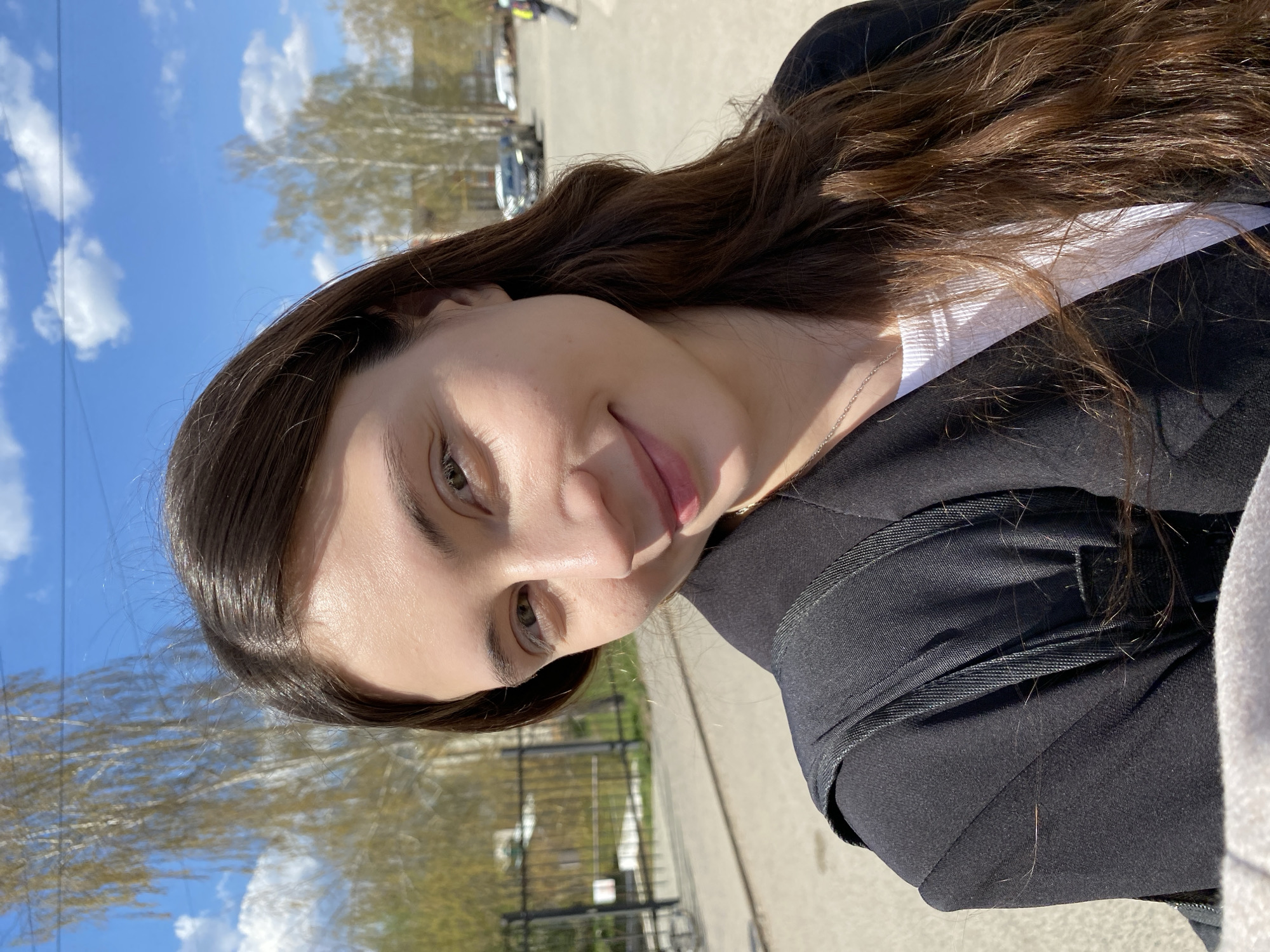 Woman takes selfies in Votkinsk park during morning outing