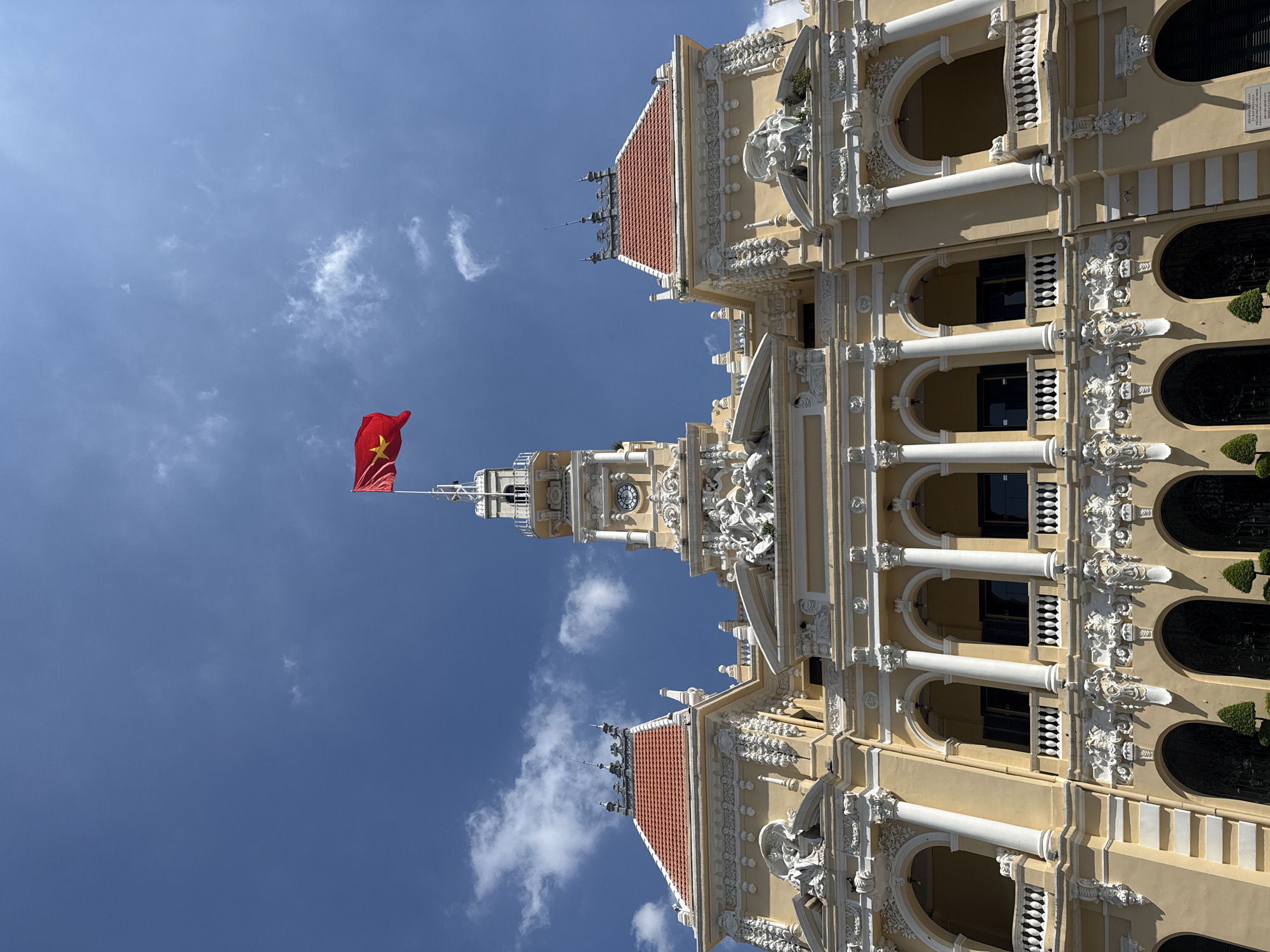 Morning out near HCMC City Hall — cafe stop, colonial architecture