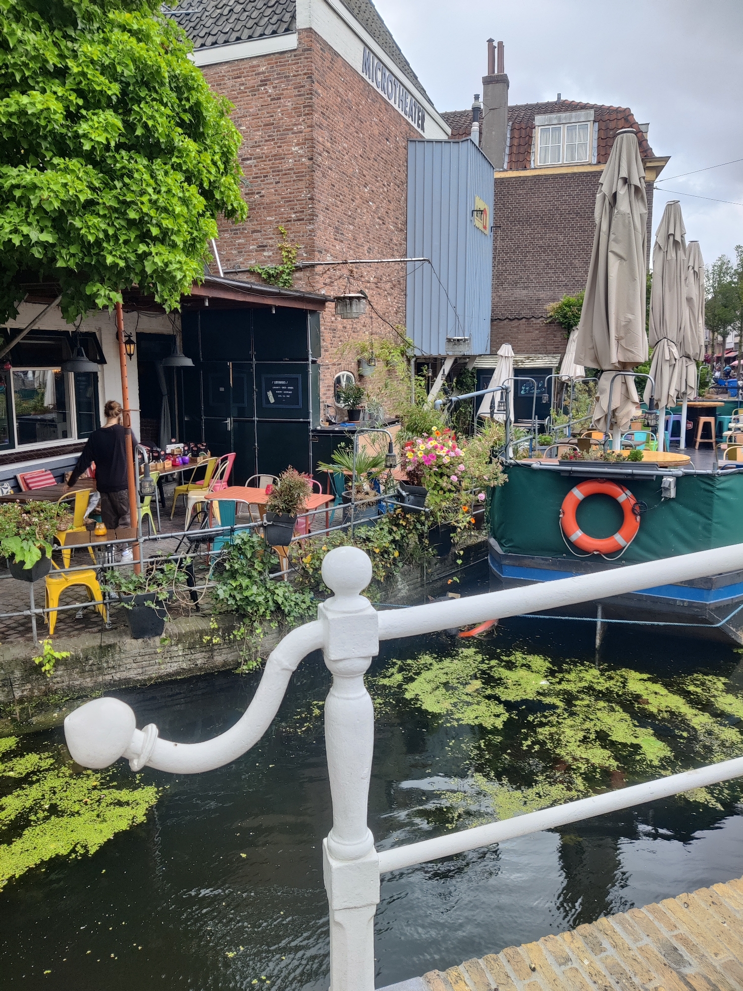Strolling Delft's canals and cobblestones toward the Oude Kerk
