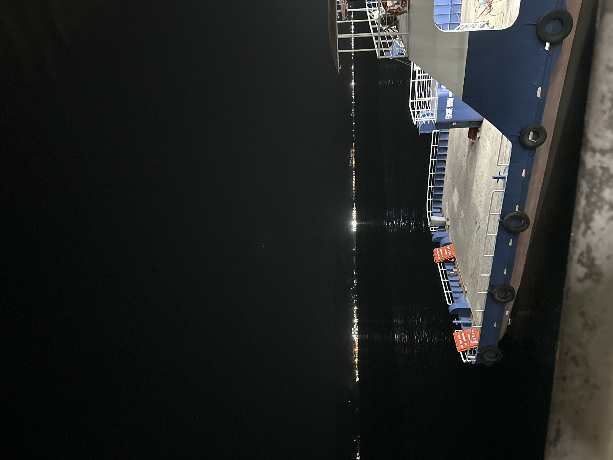 Nighttime ferry terminal activity documented in Davao City