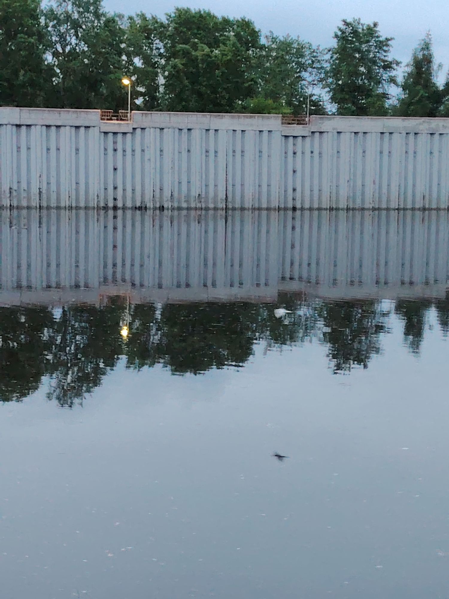 Evening documentation of Chaikovsky hydroelectric lock and waterfront scenes