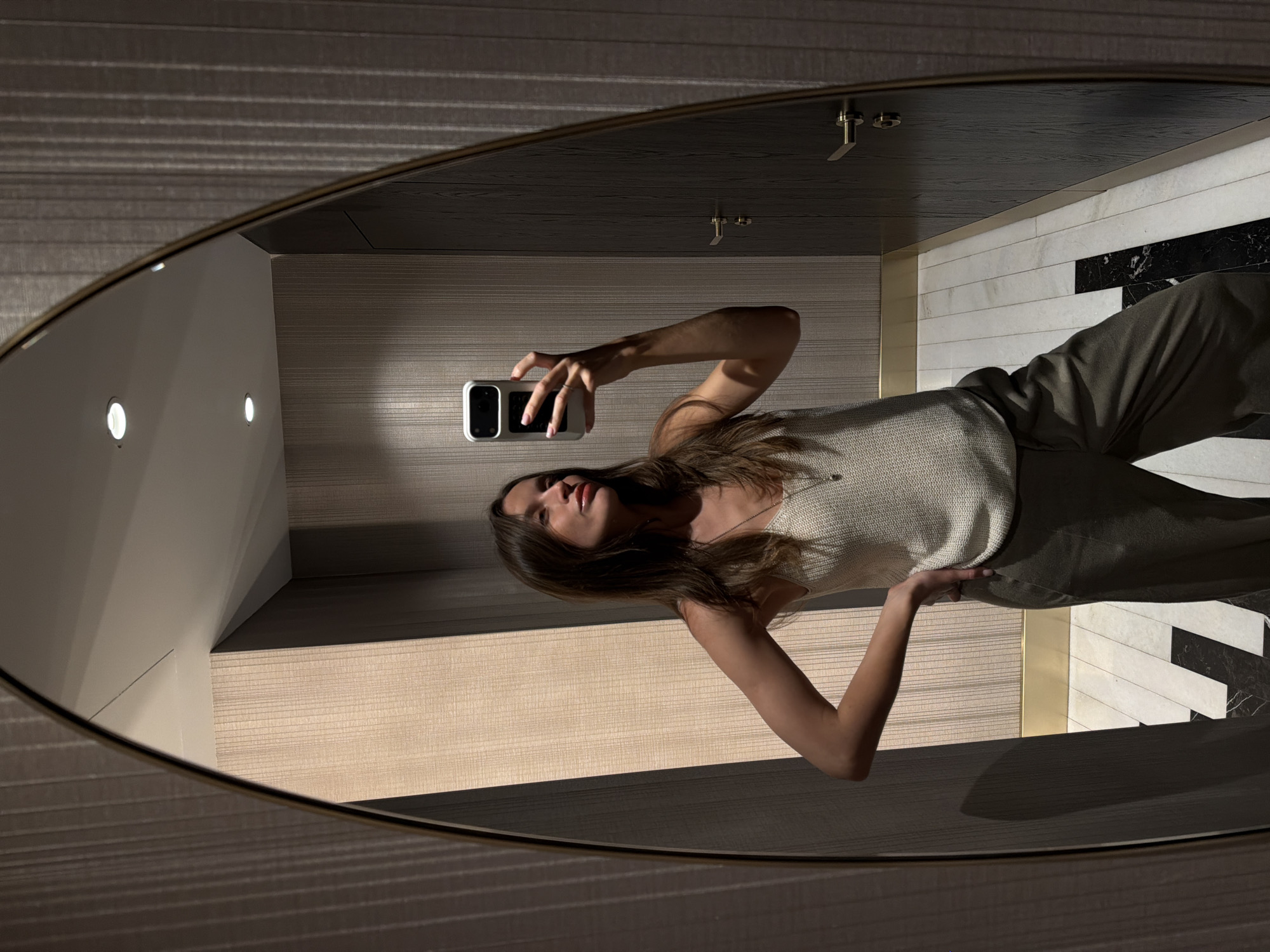 Woman takes bathroom selfies in Budva mirror
