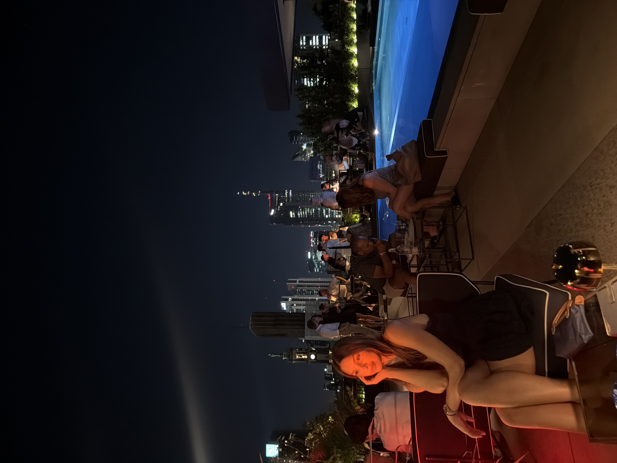 Rooftop bar night out with Milan skyline views