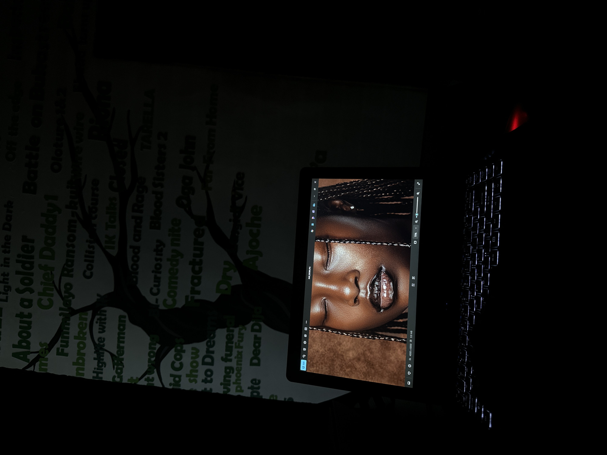 Nighttime laptop presentation session documented in Ikeja, Nigeria