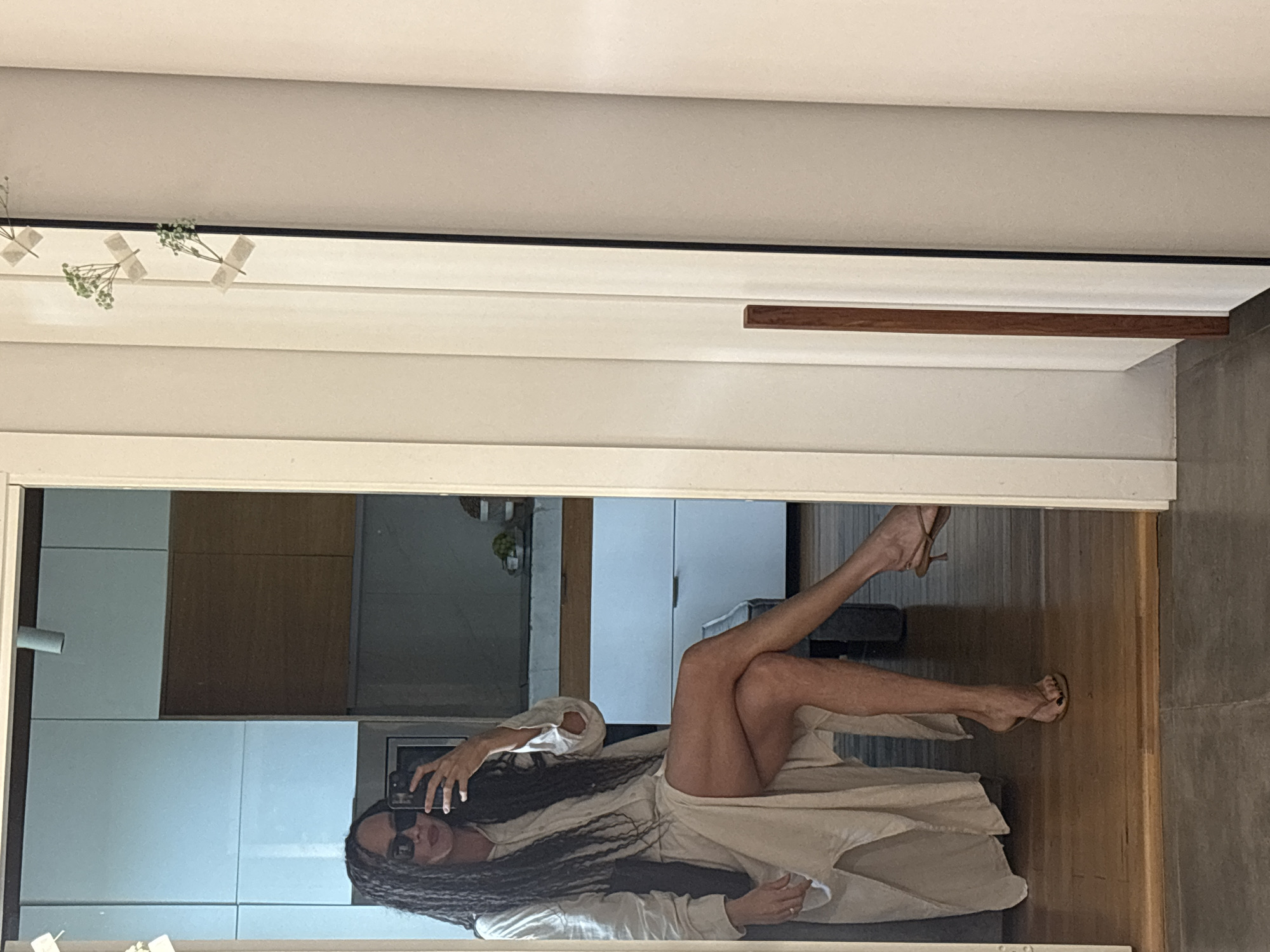Woman documents selfie session across multiple Chaikovsky locations