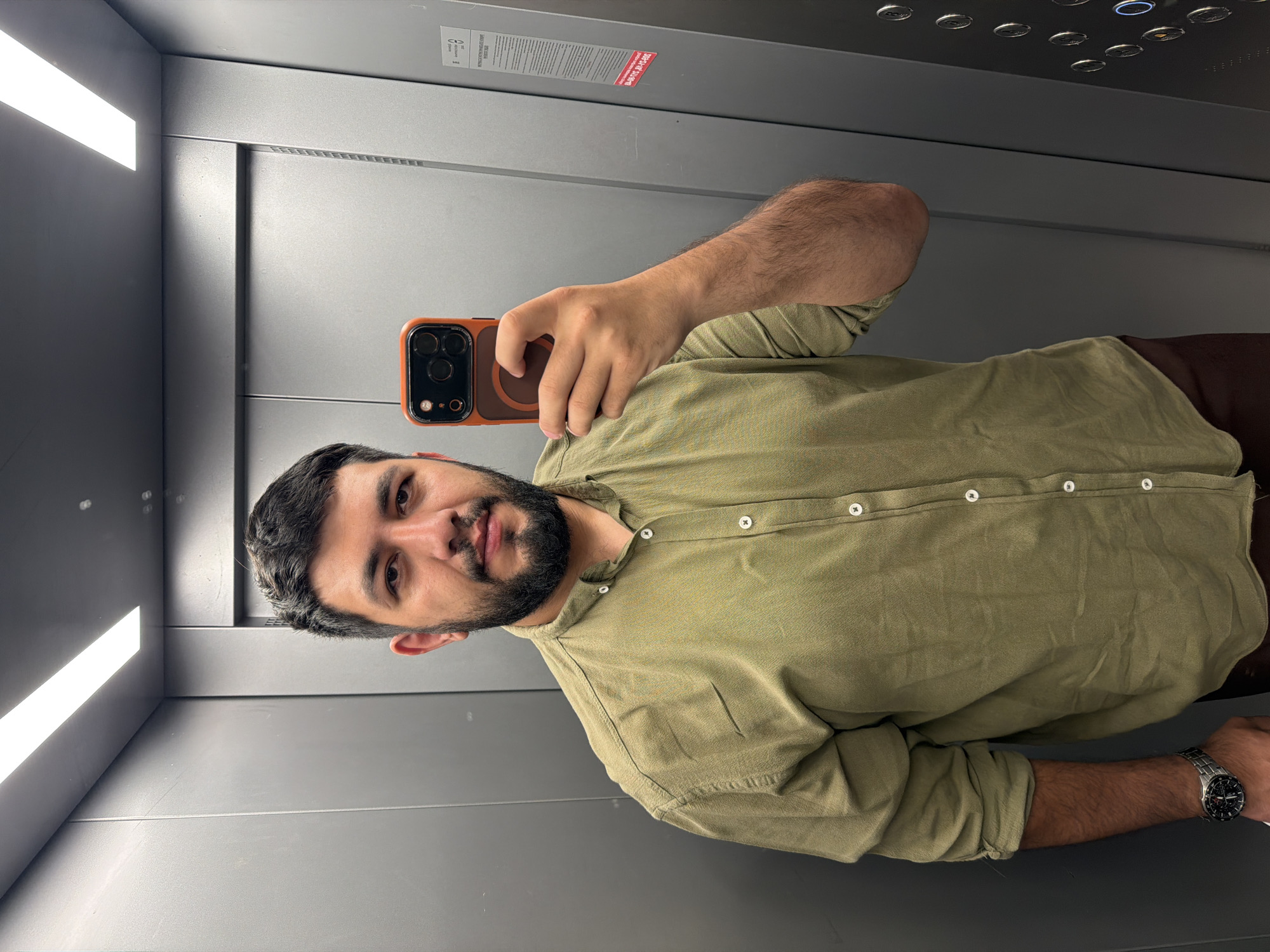 Man Takes Selfie in Elevator in Krasnoyarsk