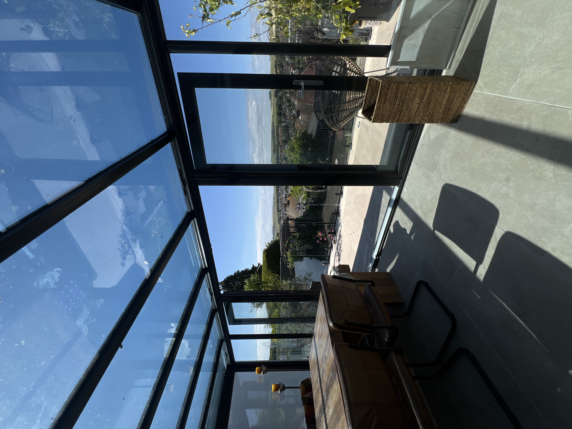 Sunny Brighton afternoon: sunroom views, bedroom windows, and tennis
