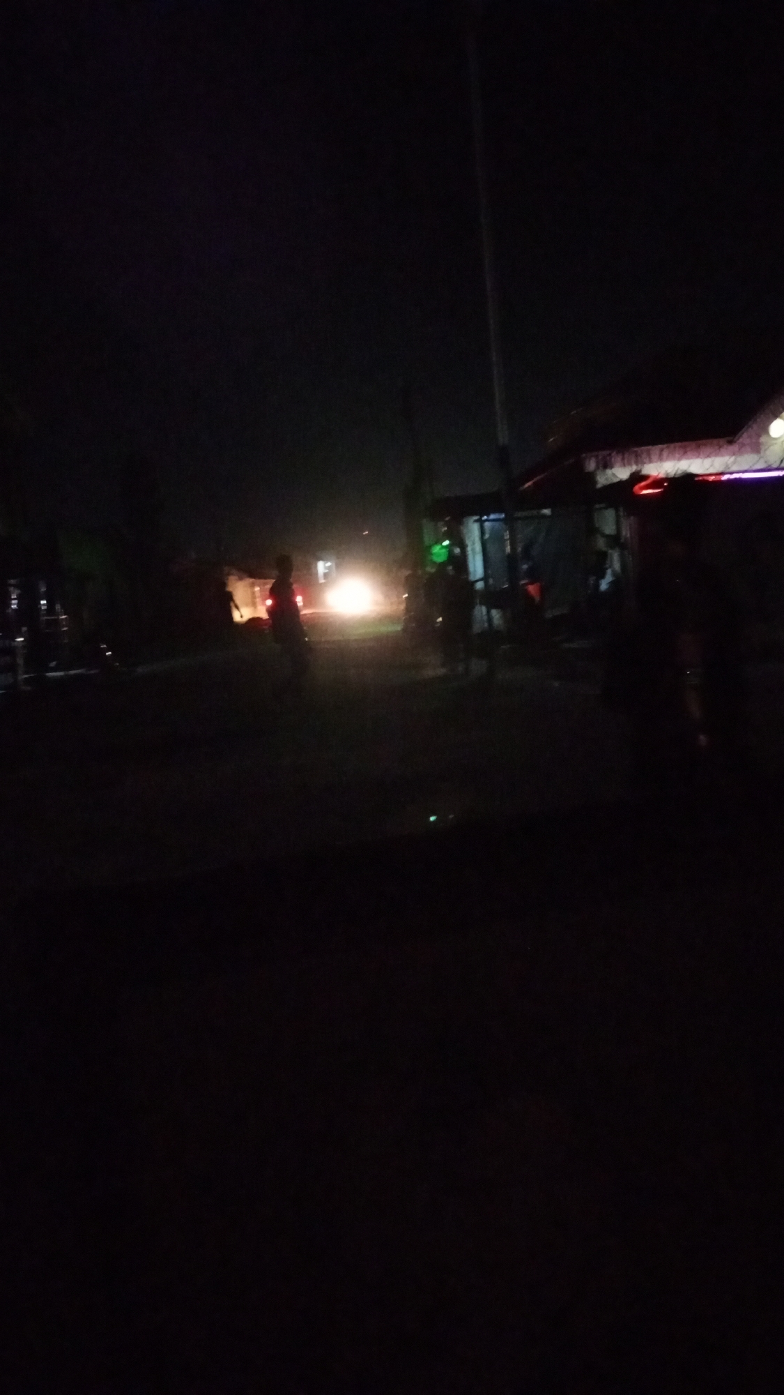Colorful lights illuminate building in Sabon Tasha Nigeria nighttime