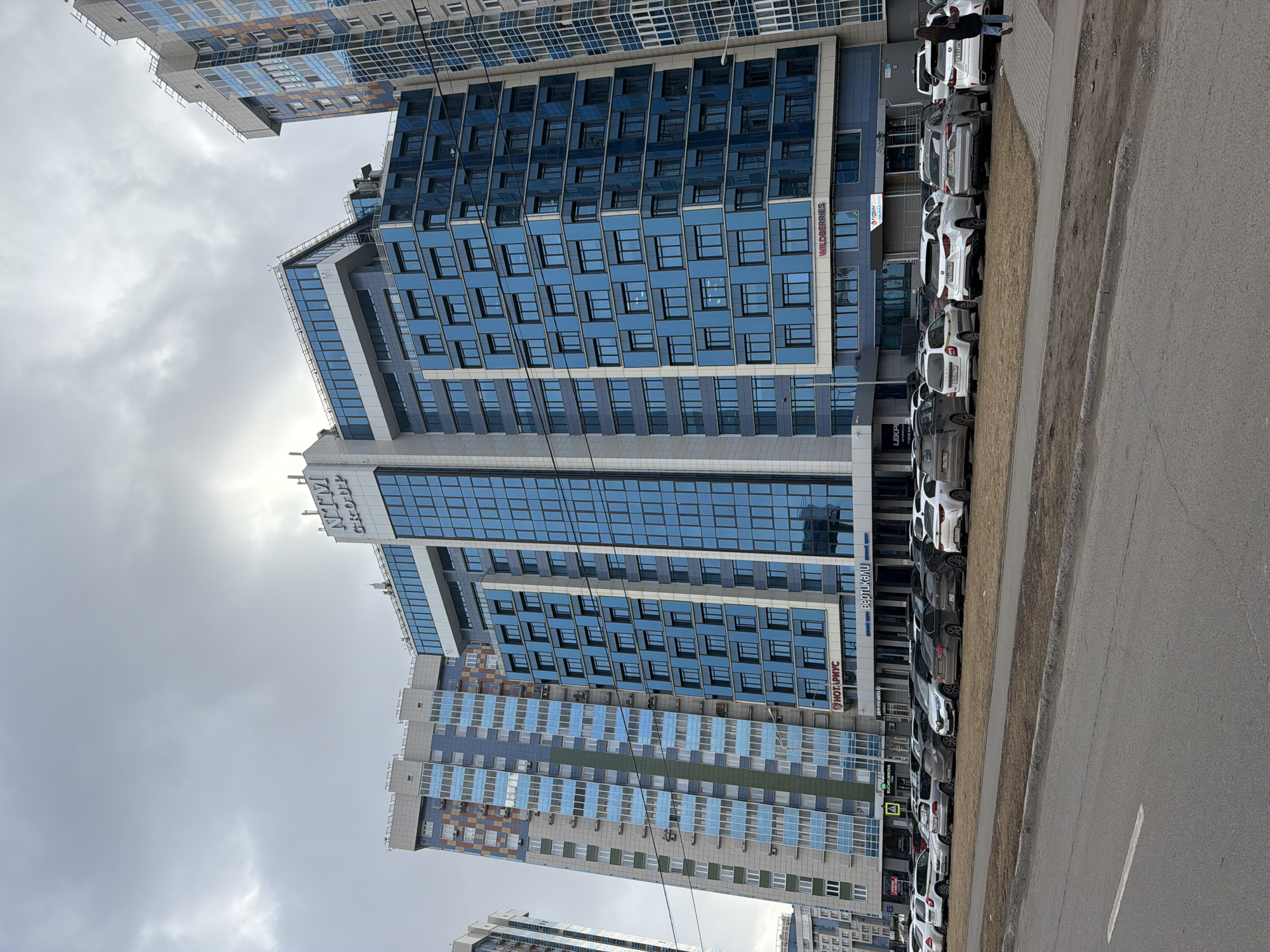 Urban street scene with high-rises observed in Krasnoyarsk