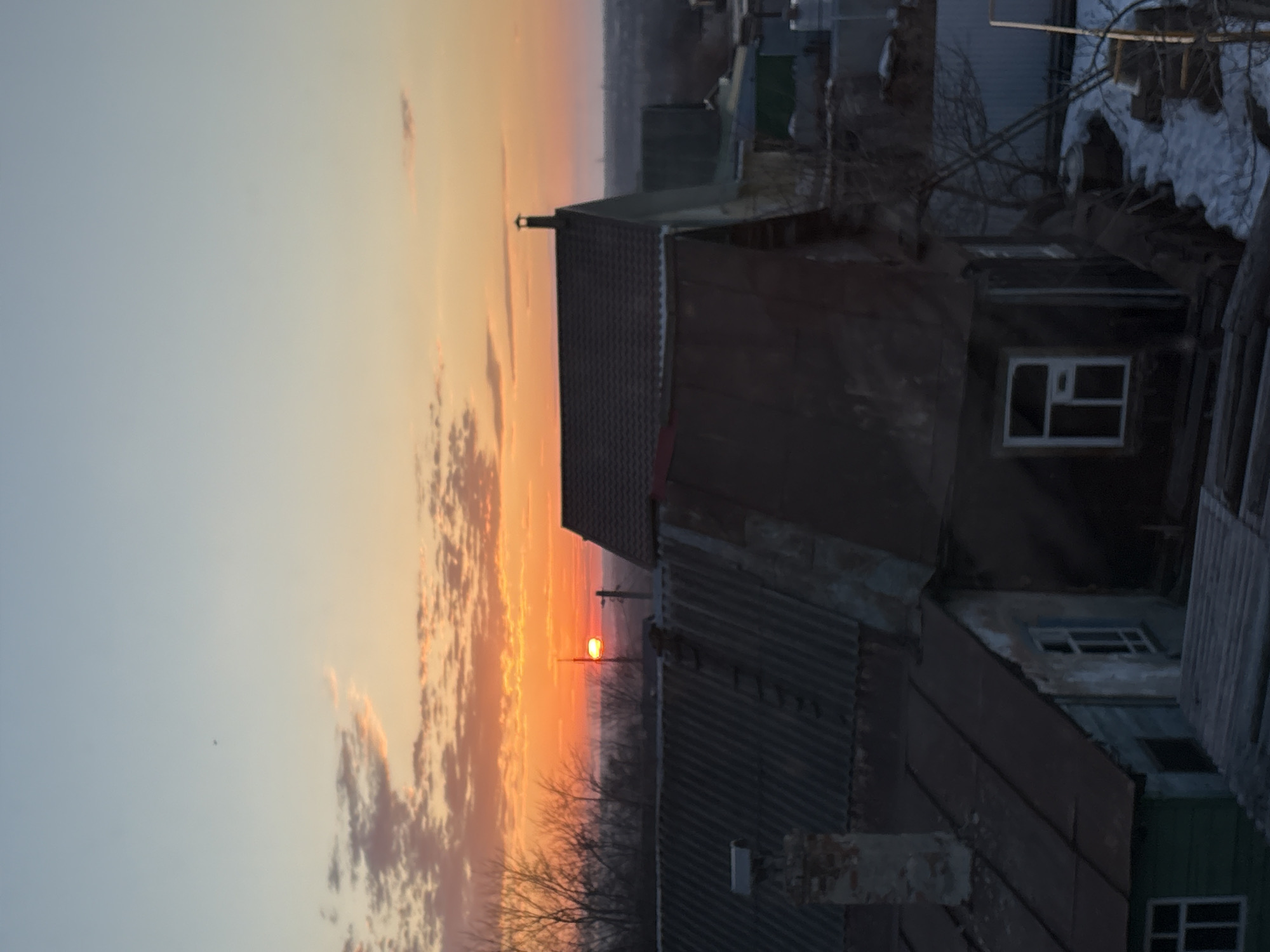Sunset captured over Ulyanovsk cityscape from multiple viewpoints