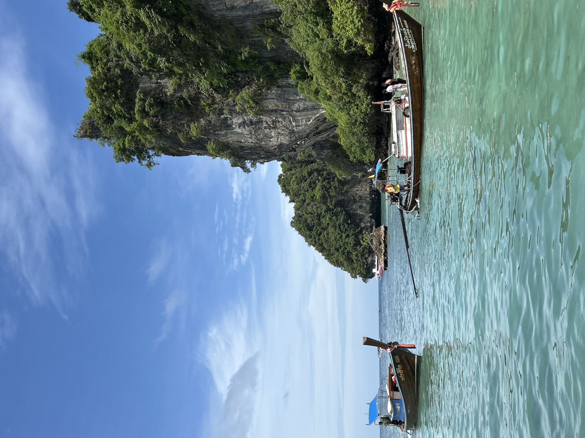 Morning tourist activities captured around Ko Thailand's limestone bays