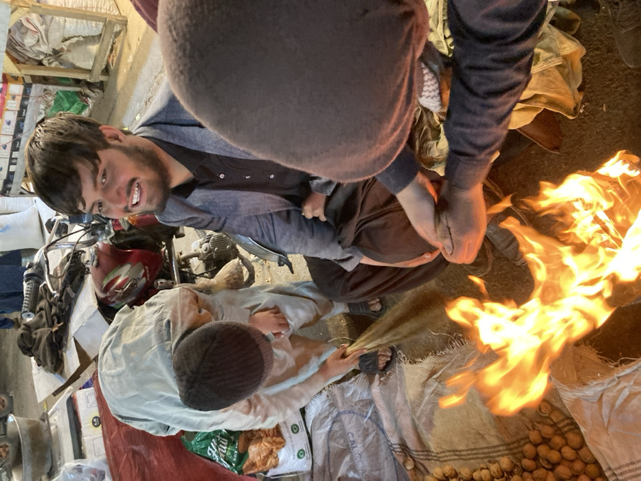 Vendors tend fire at Quetta marketplace amid nuts, dried fruits