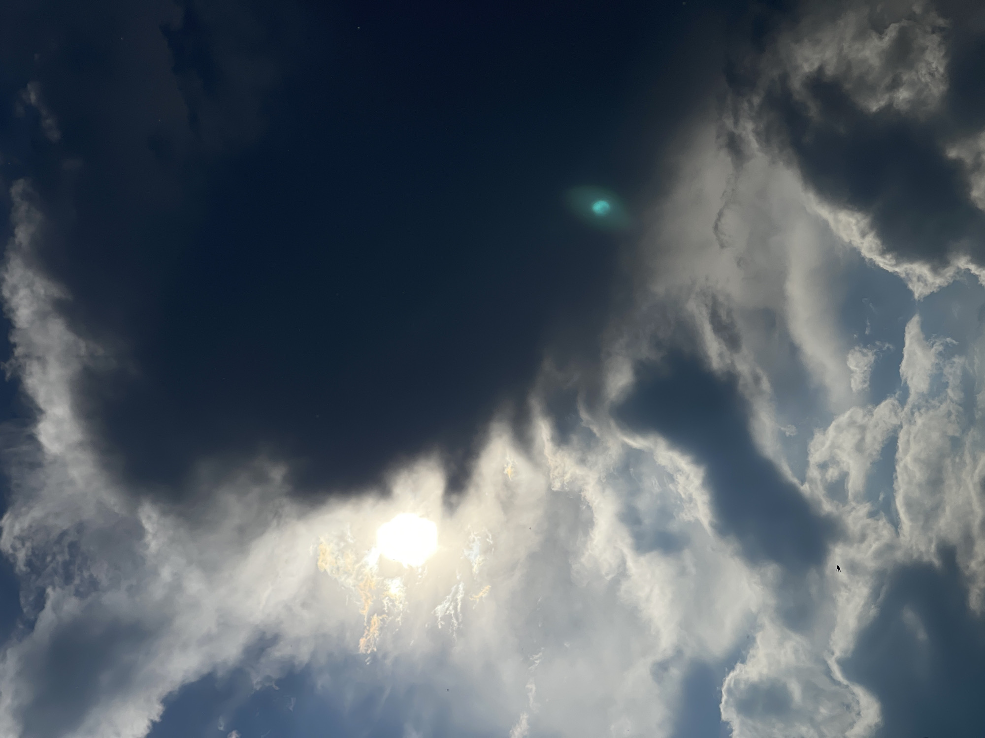 Storm clouds and sunlight create dramatic sky contrast
