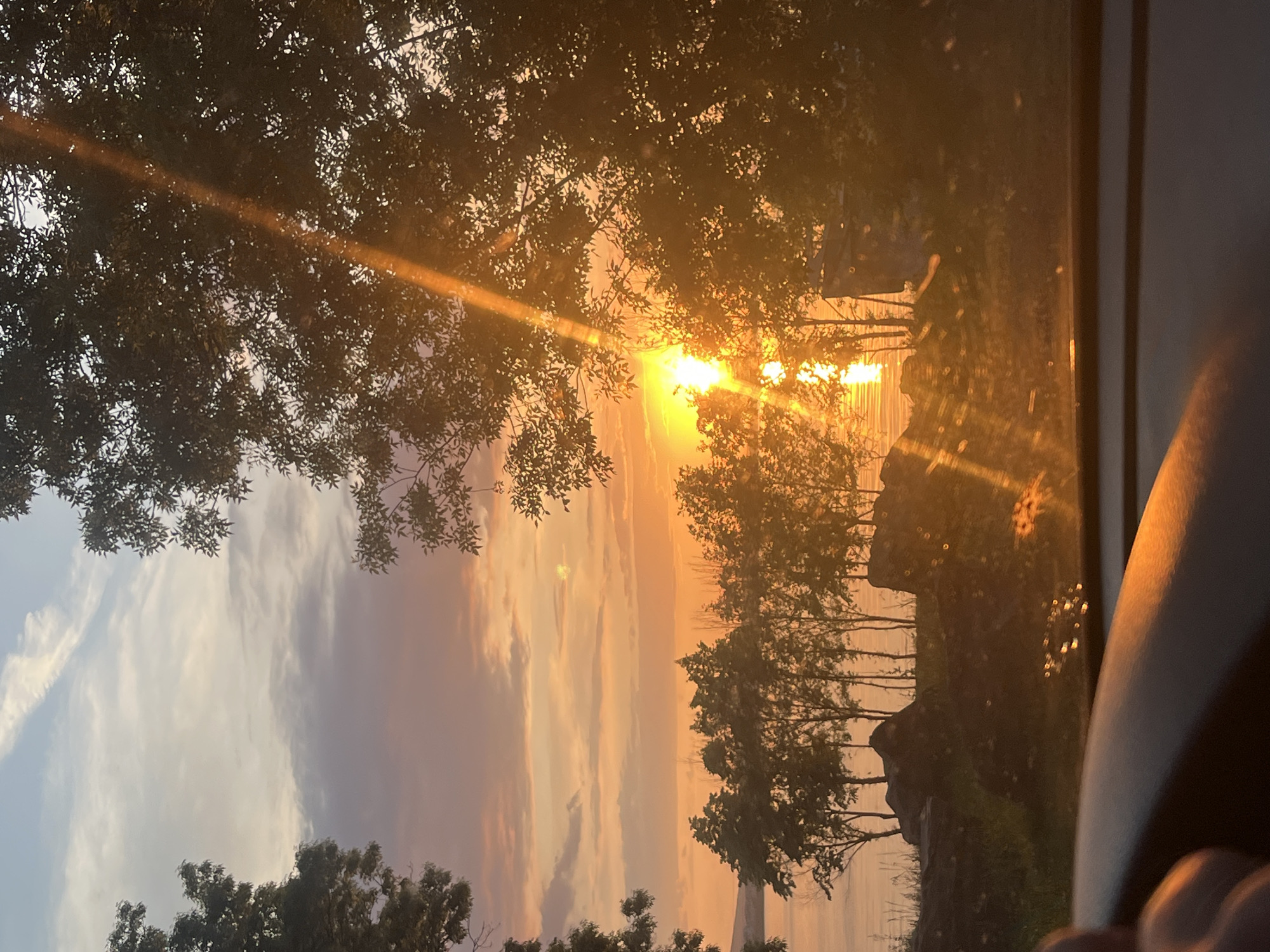 Sunset over water witnessed from multiple locations in Burgas