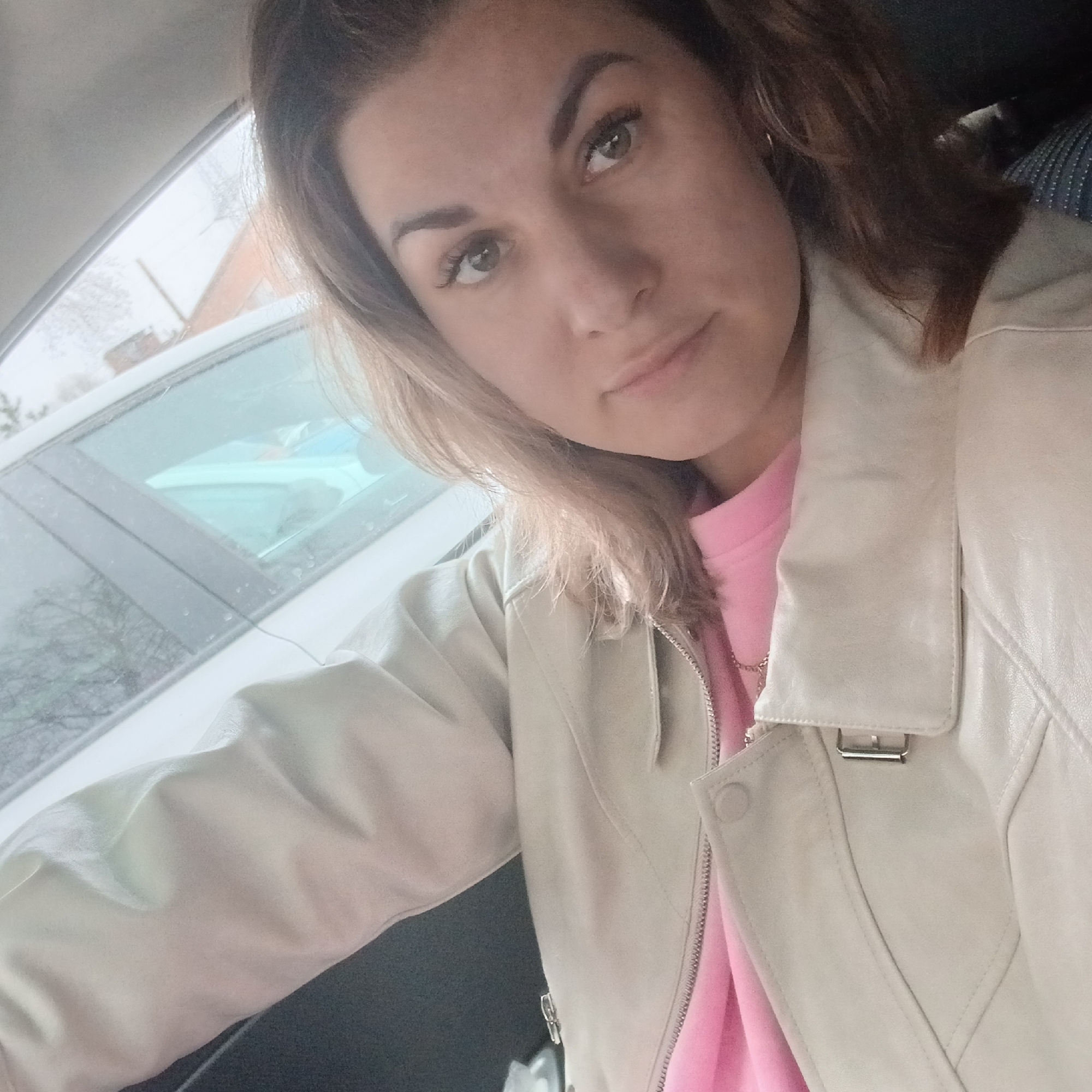 Woman takes car selfie in Izhevsk, Russia