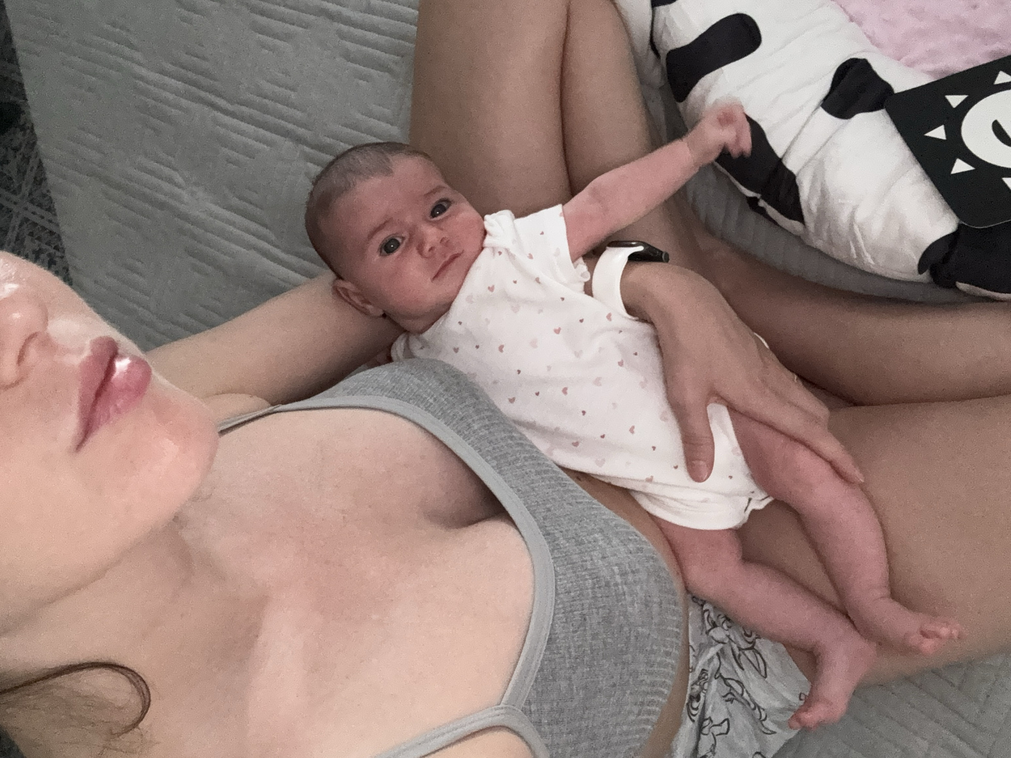 Mother and infant bonding moments captured in Italian seaside town