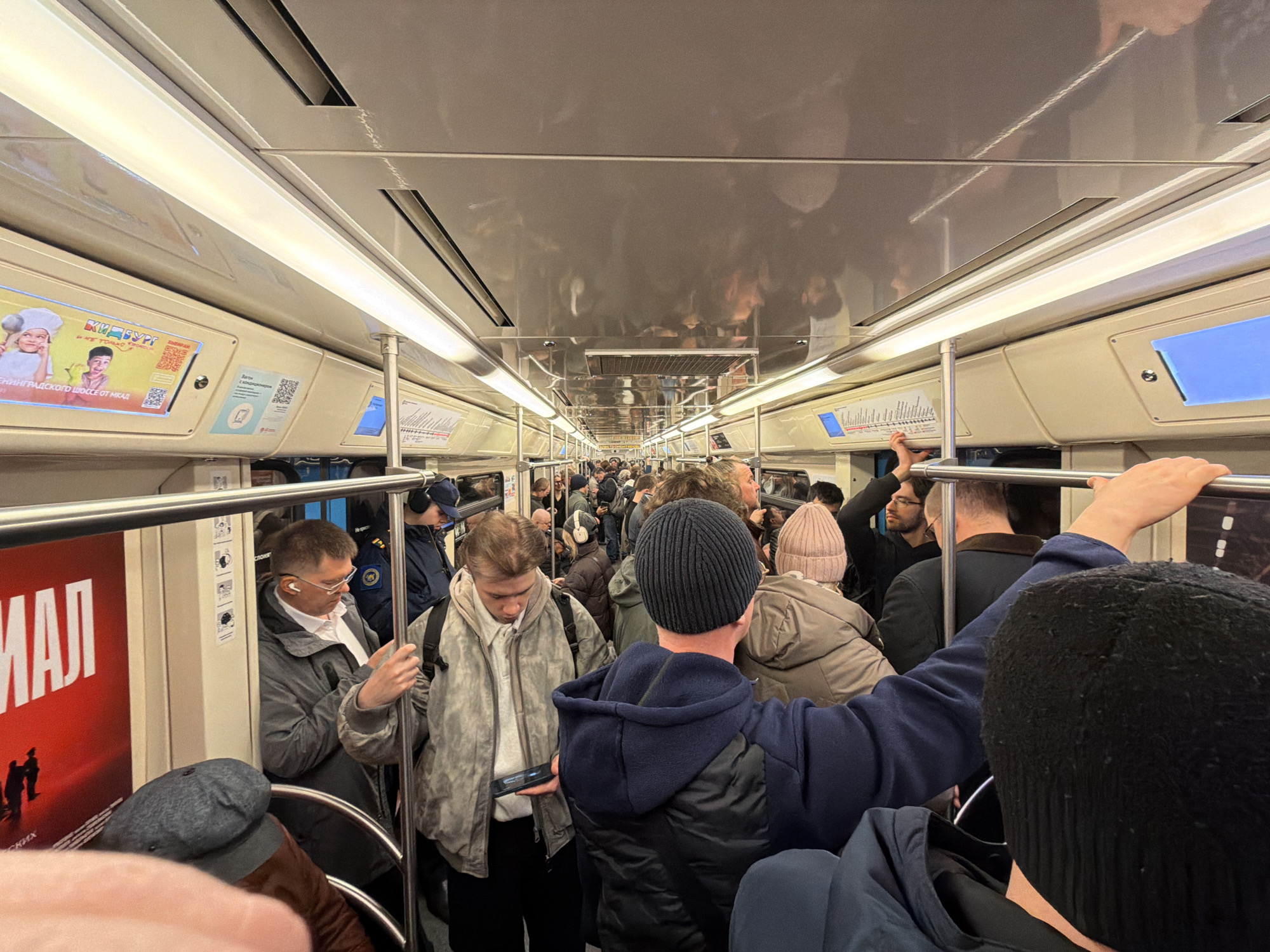Packed Moscow Metro train during rush hour commute