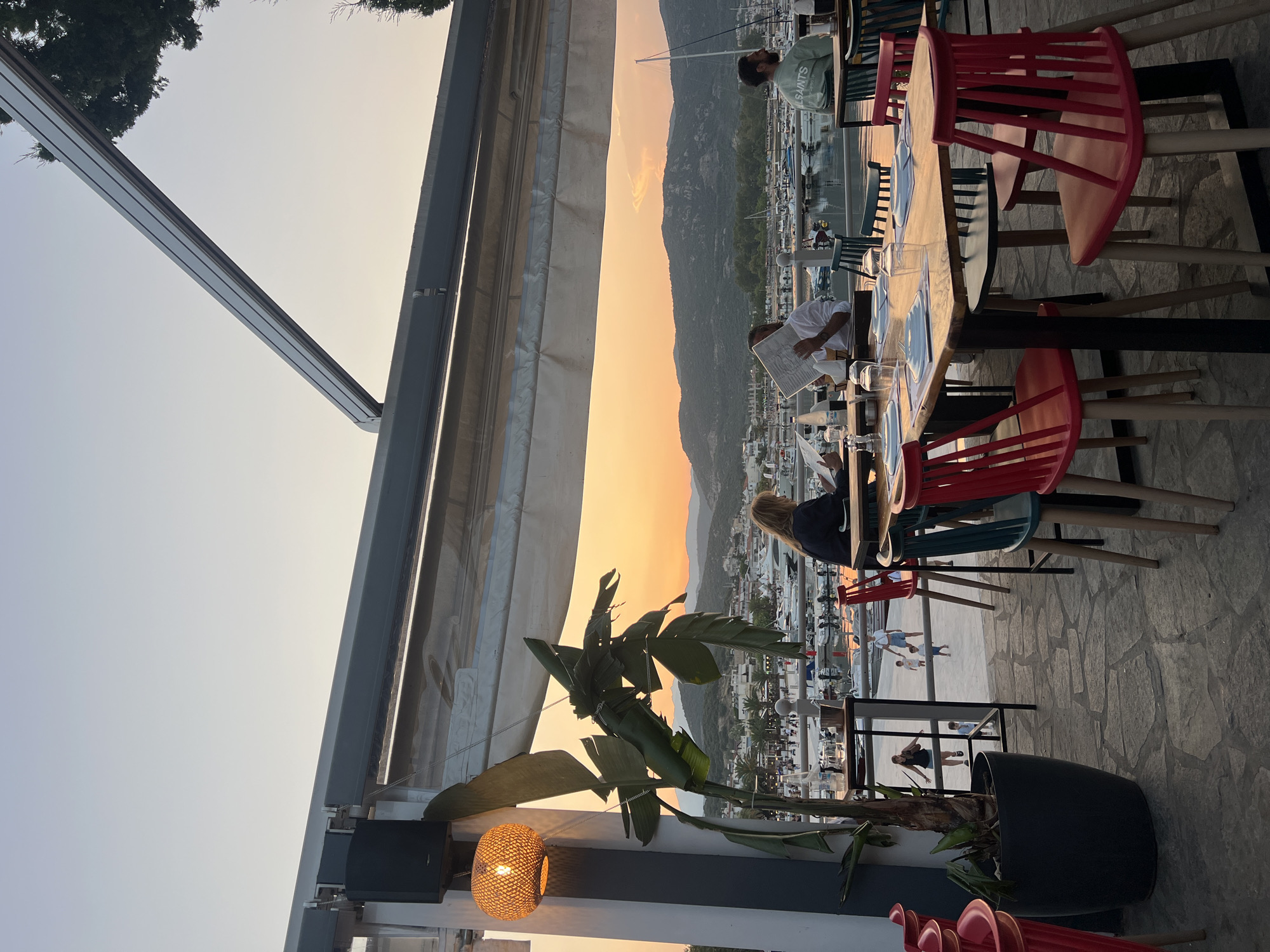 Sunset dinner at a marina, then arcade games after dark