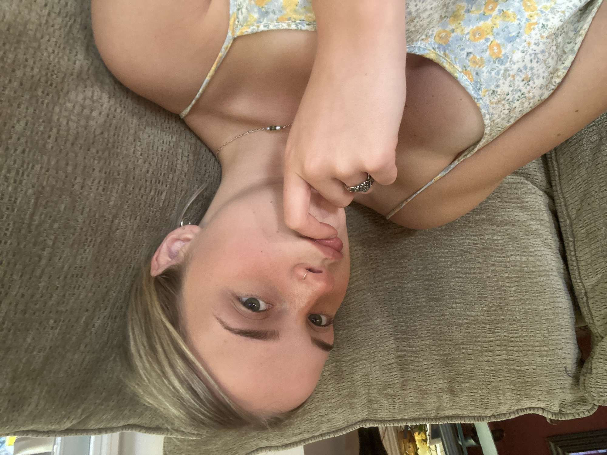 Young person photographed on couch in Whistler residence