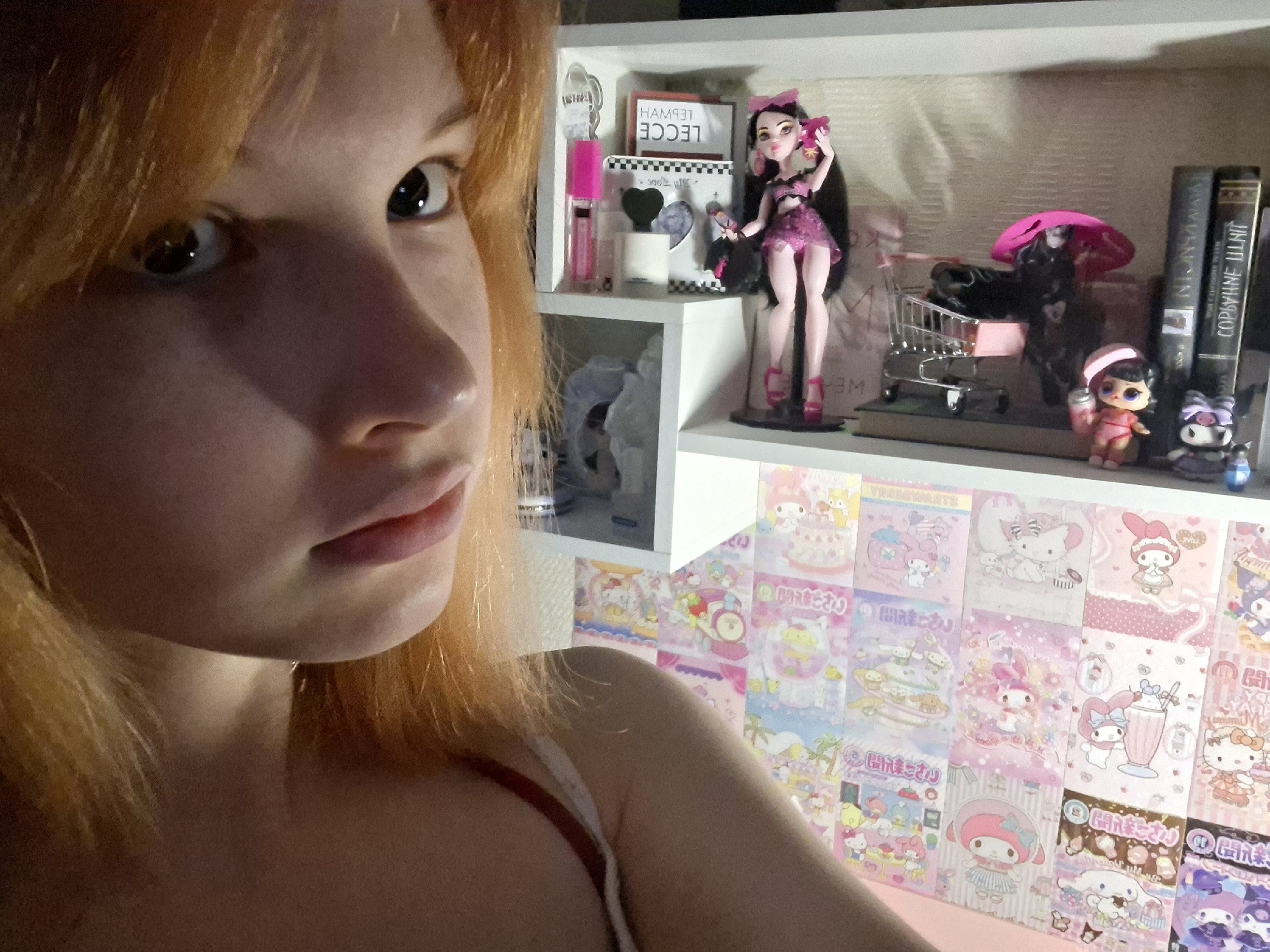 Indoor selfie captures person with orange hair near shelving