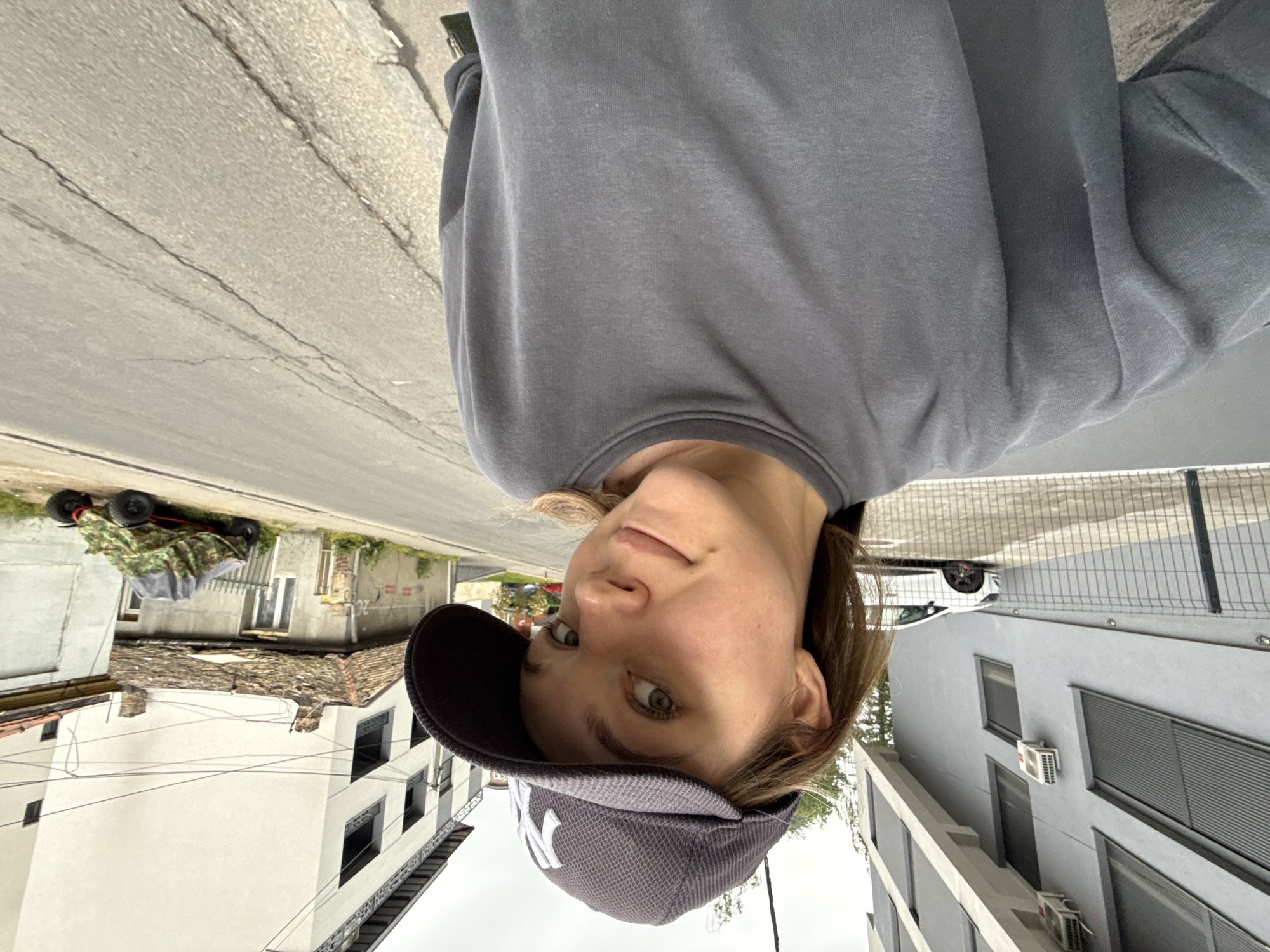 Young person takes morning selfies around Belgrade neighborhood