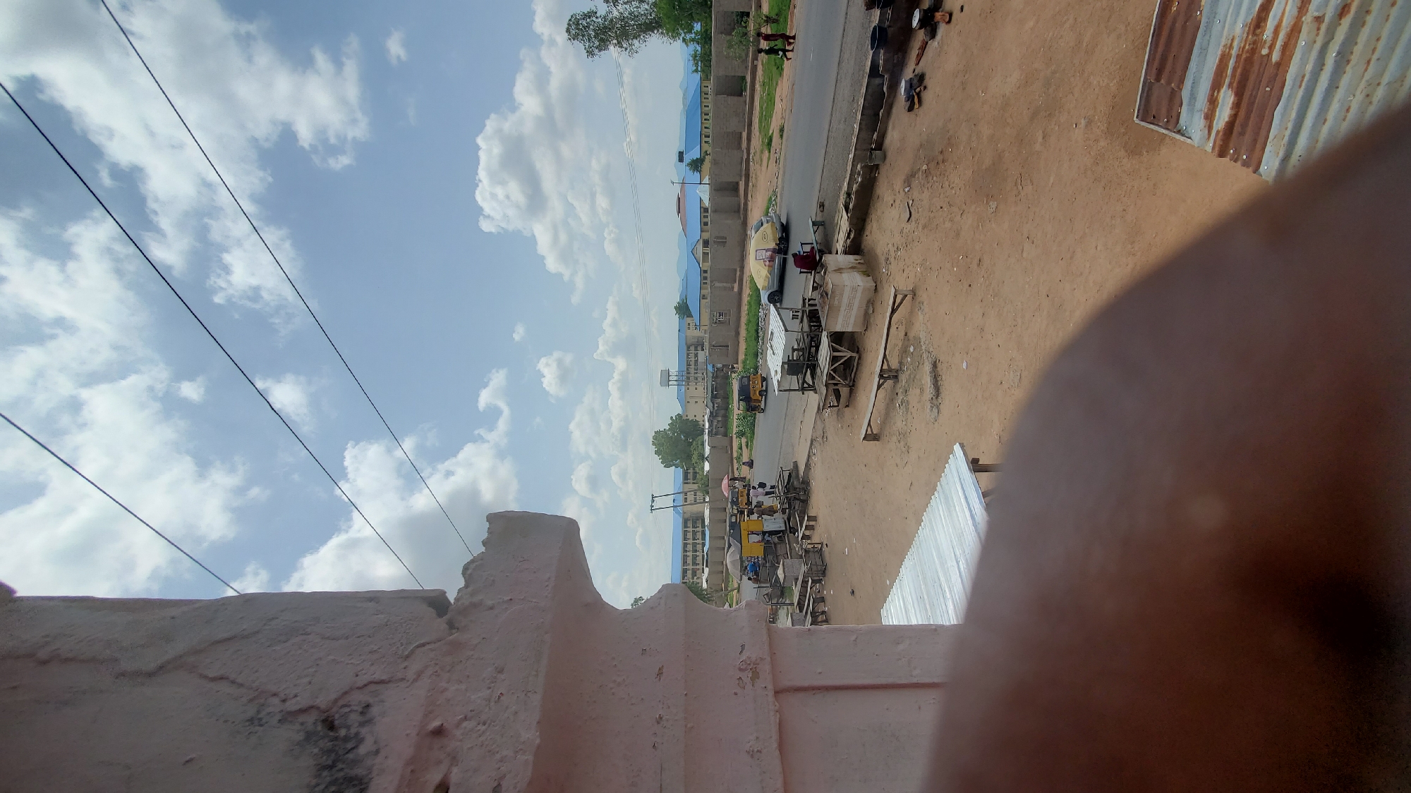 Street life along a busy roadside in a small African town