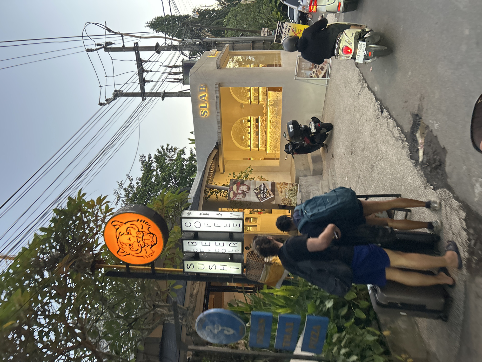 Ubud streets: temples, a bakery, and scooter traffic