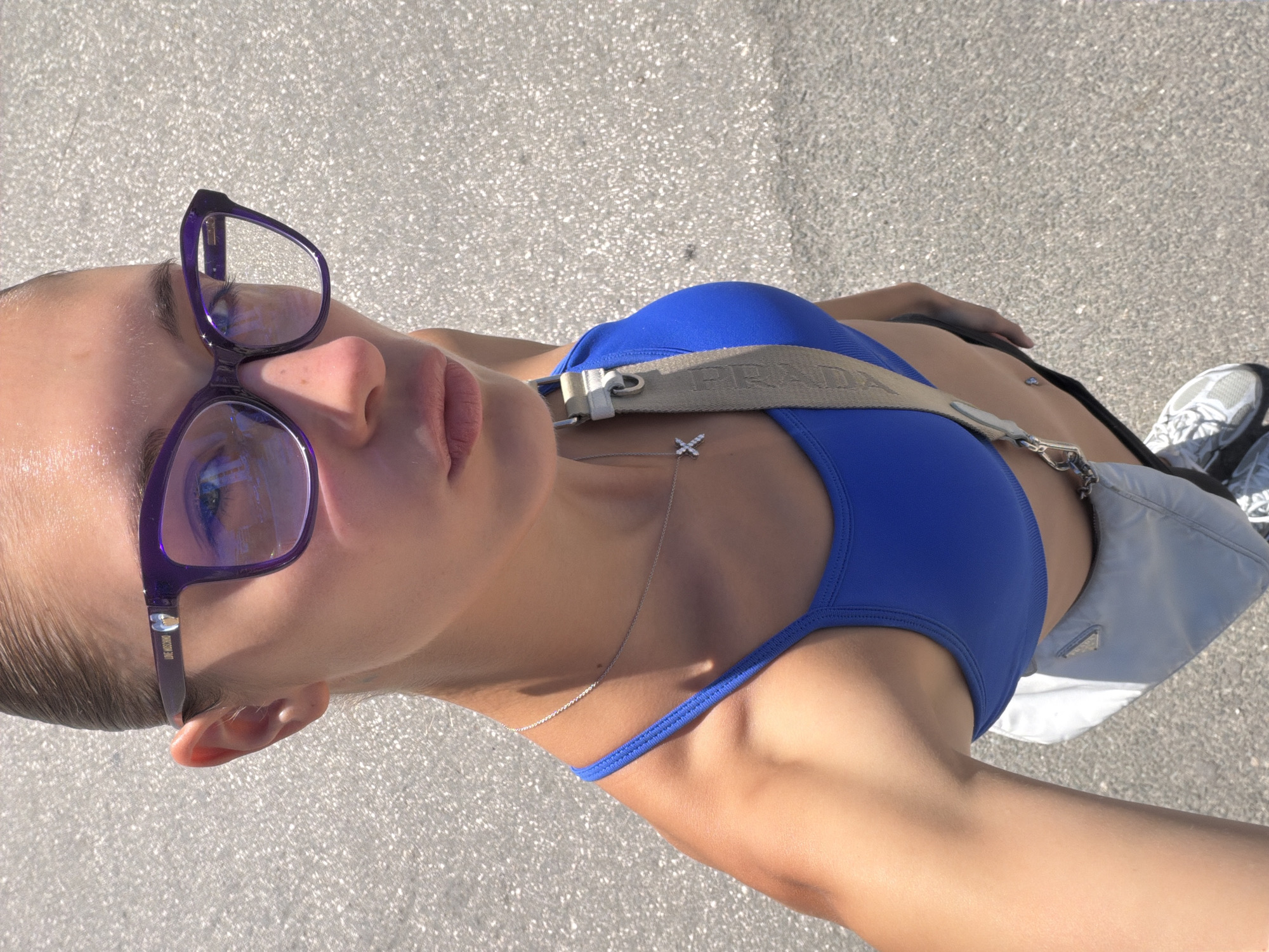 Beach day selfies and coastal promenade scenes on a clear morning