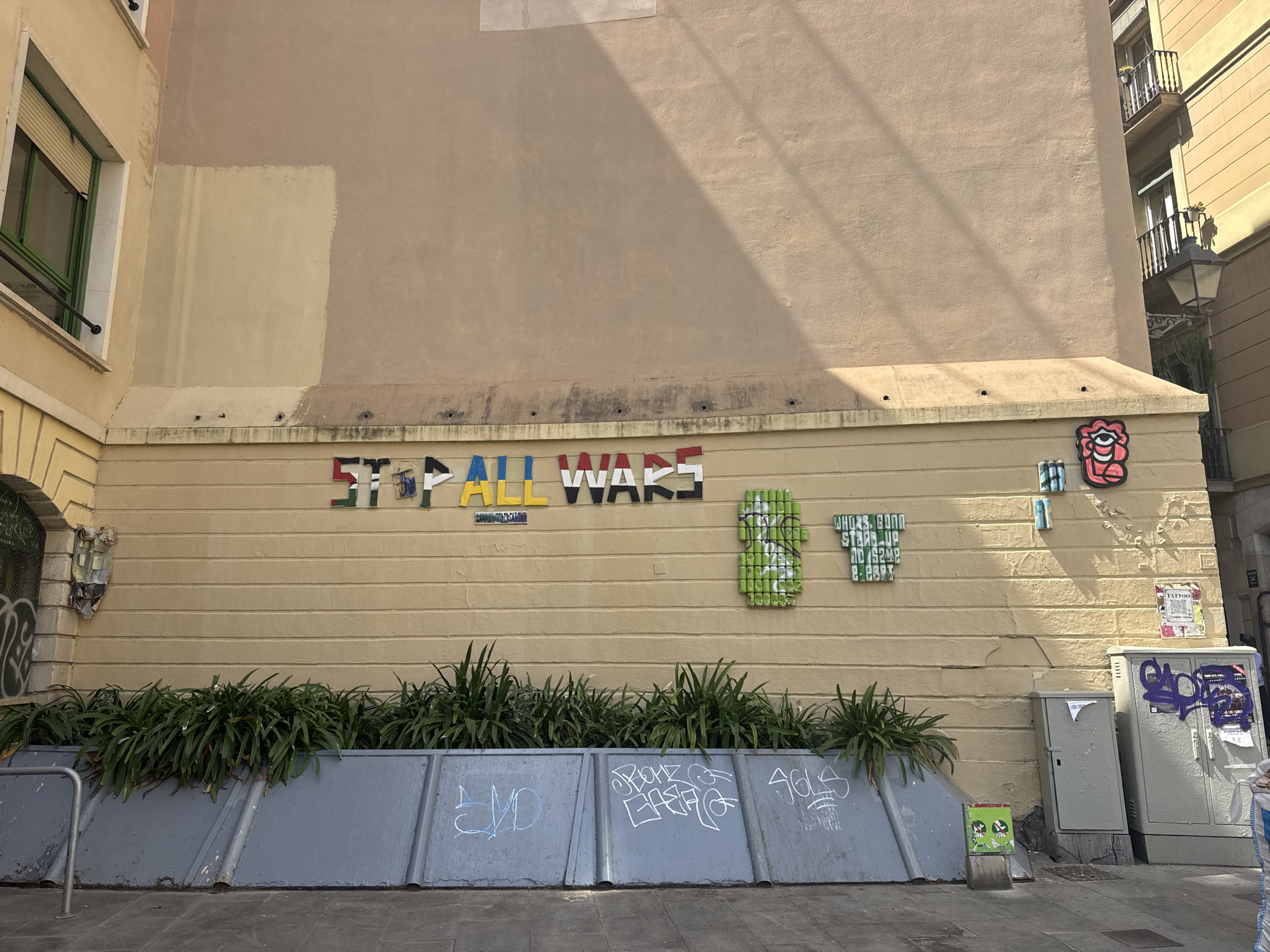 Barcelona street scenes include emergency response, architecture, street art