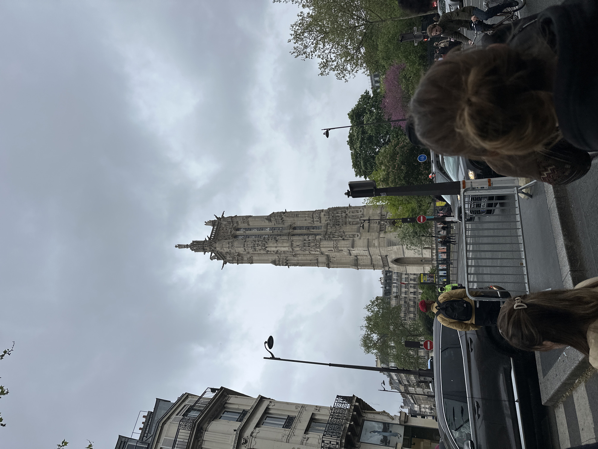 Rainy afternoon scenes captured across central Paris landmarks and streets