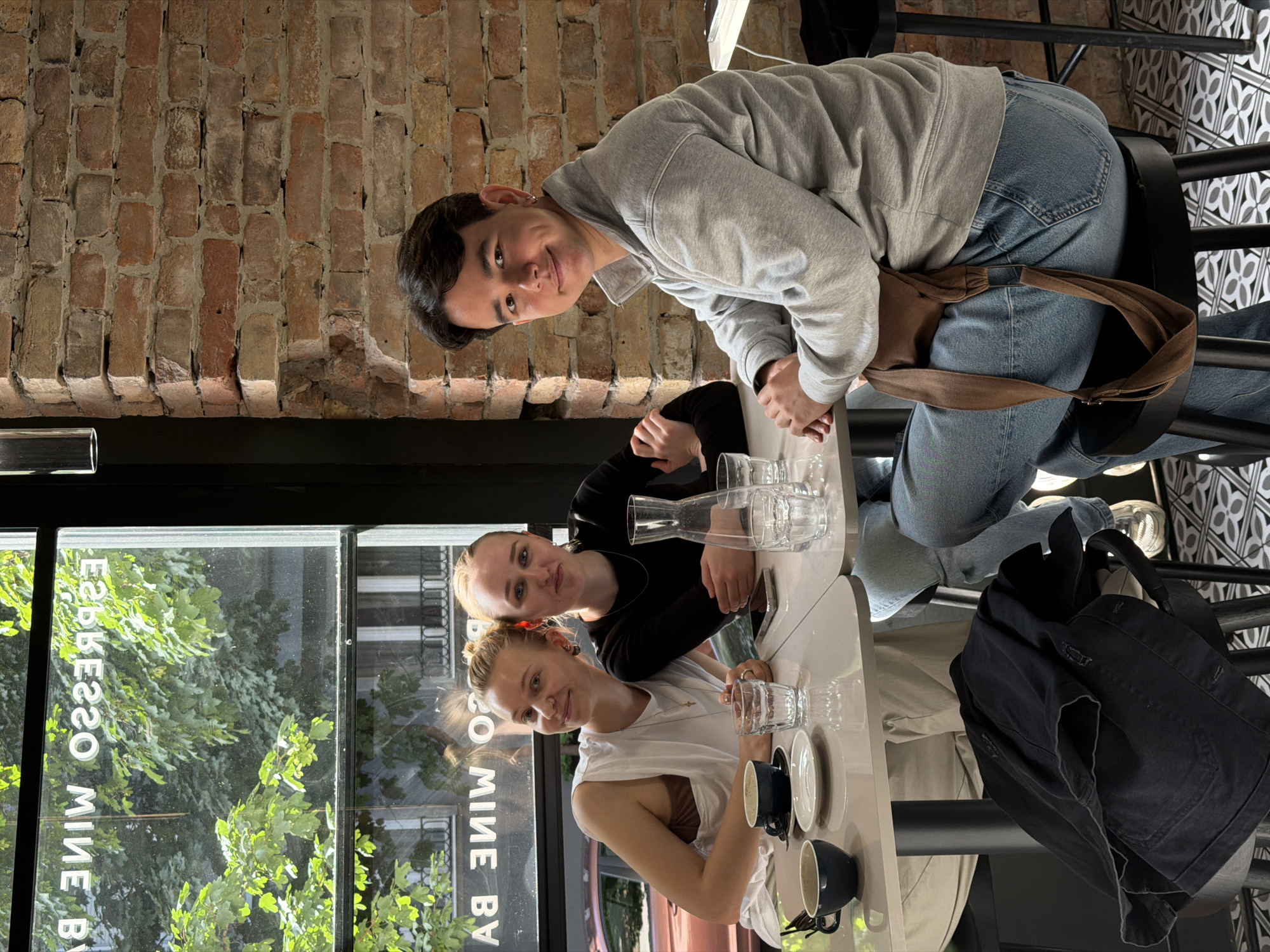Young man photographed during afternoon café visit in Belgrade