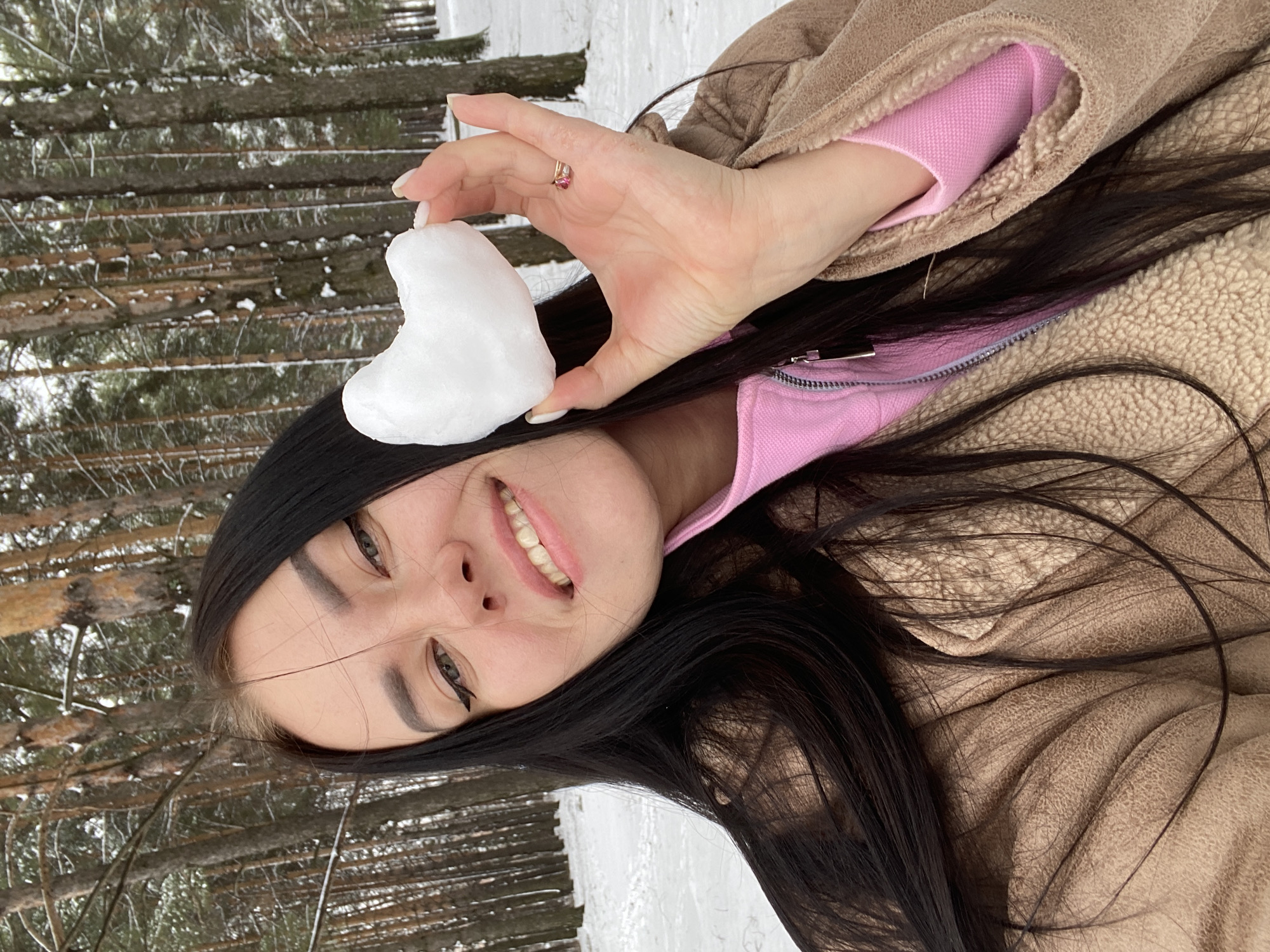Woman films snowy playground visit in Chaikovsky, Russia