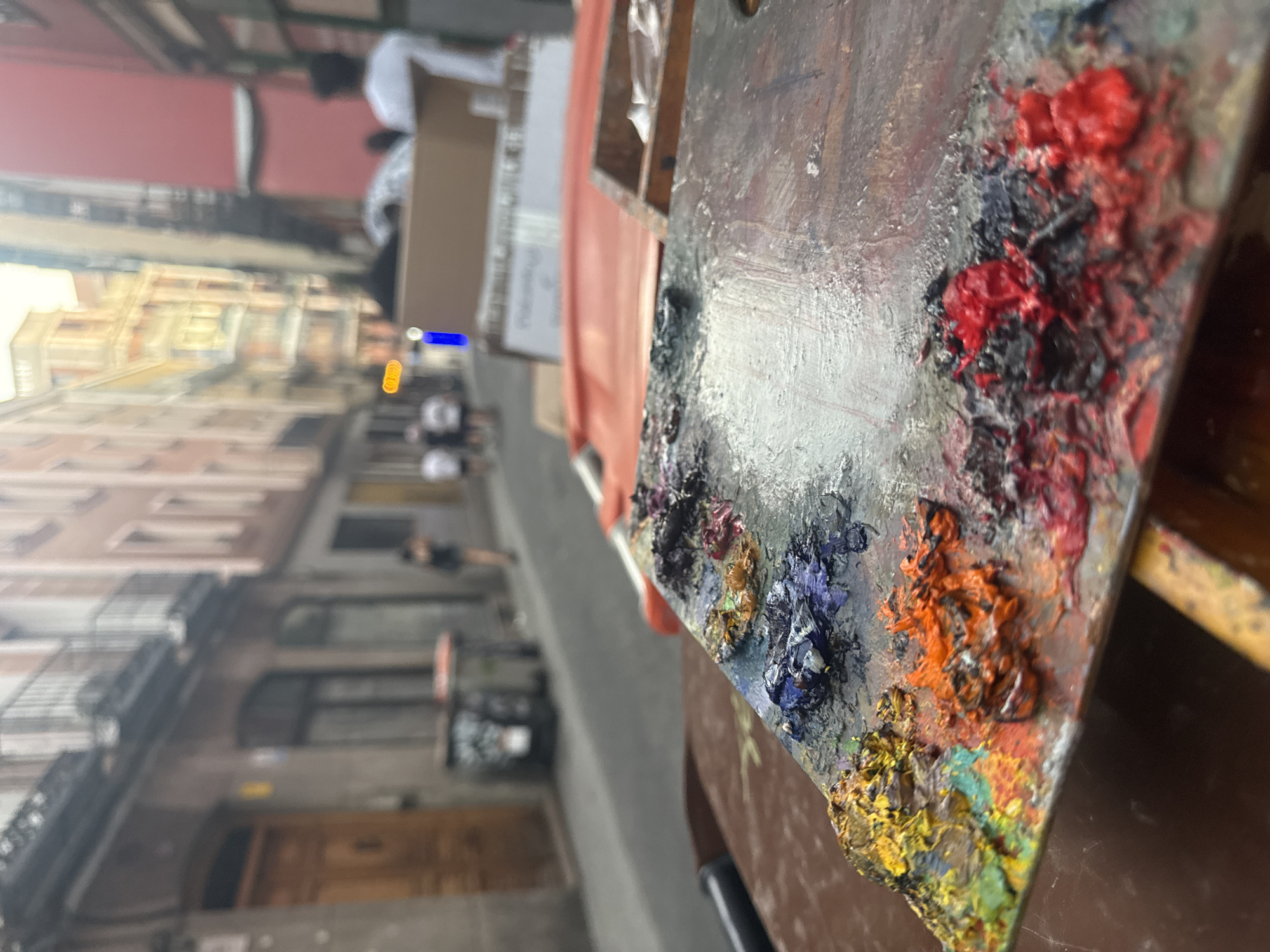 Oil paint palette close-up, Madrid studio.
