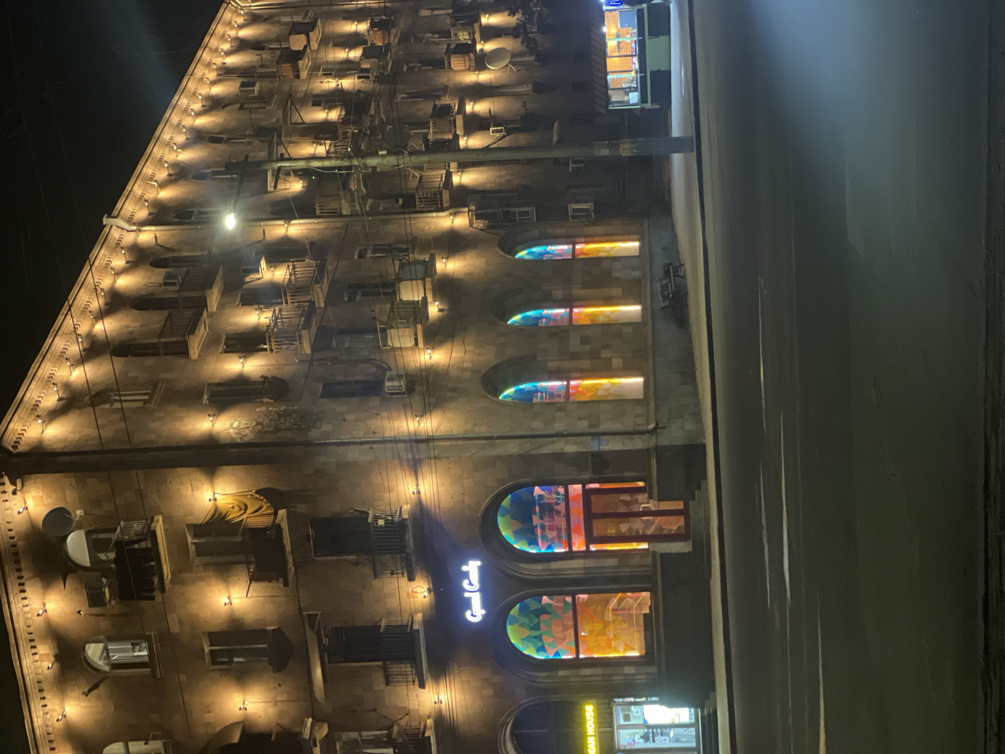 Evening scenes captured in Yerevan showing illuminated buildings, traffic