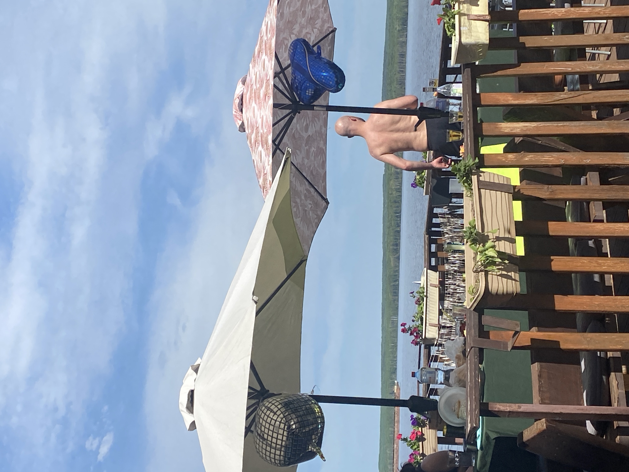 Riverside gathering with balloons, motorcycles documented in Chaikovsky, Russia