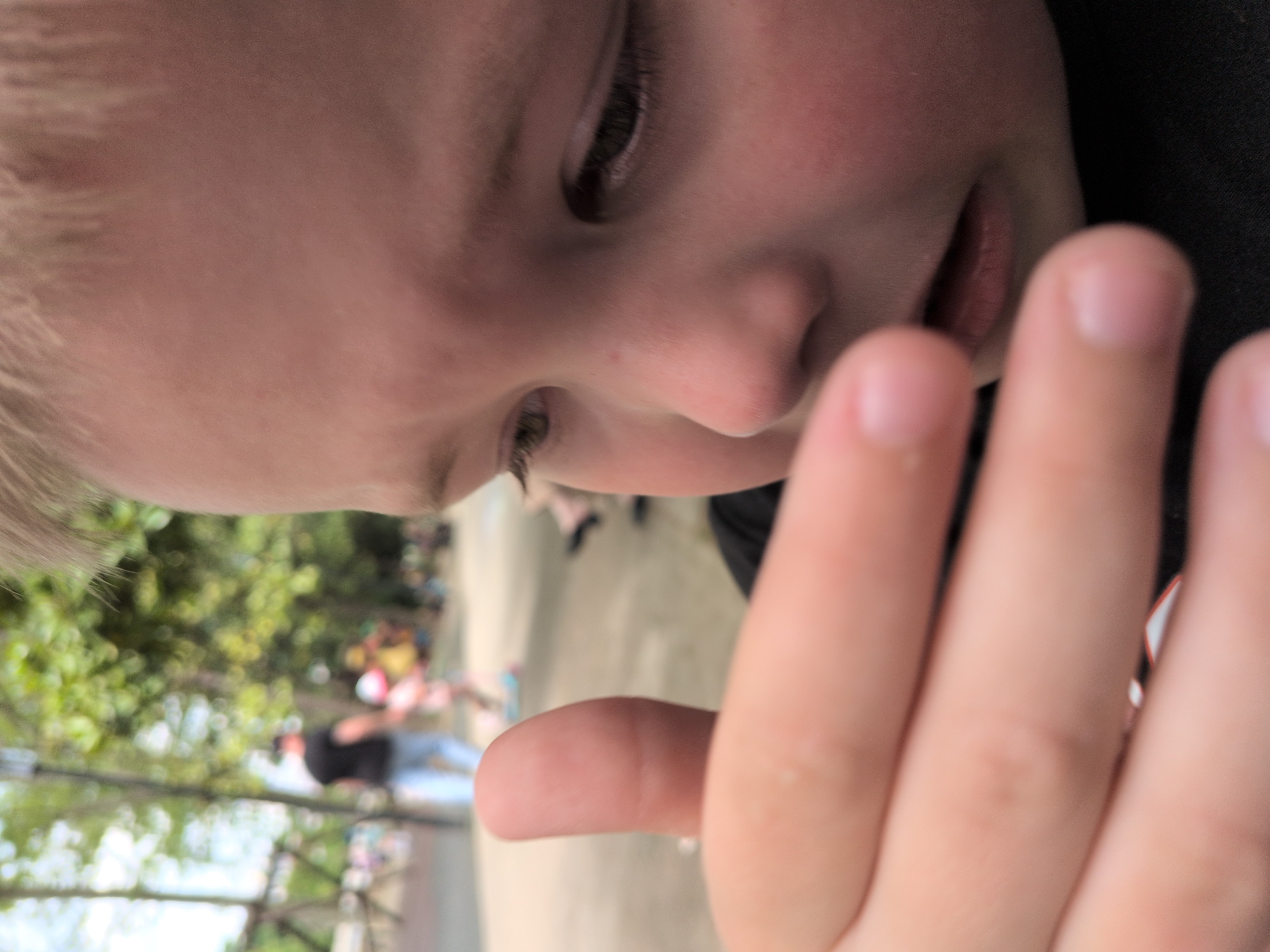 Boy plays in Sochi park during morning outing