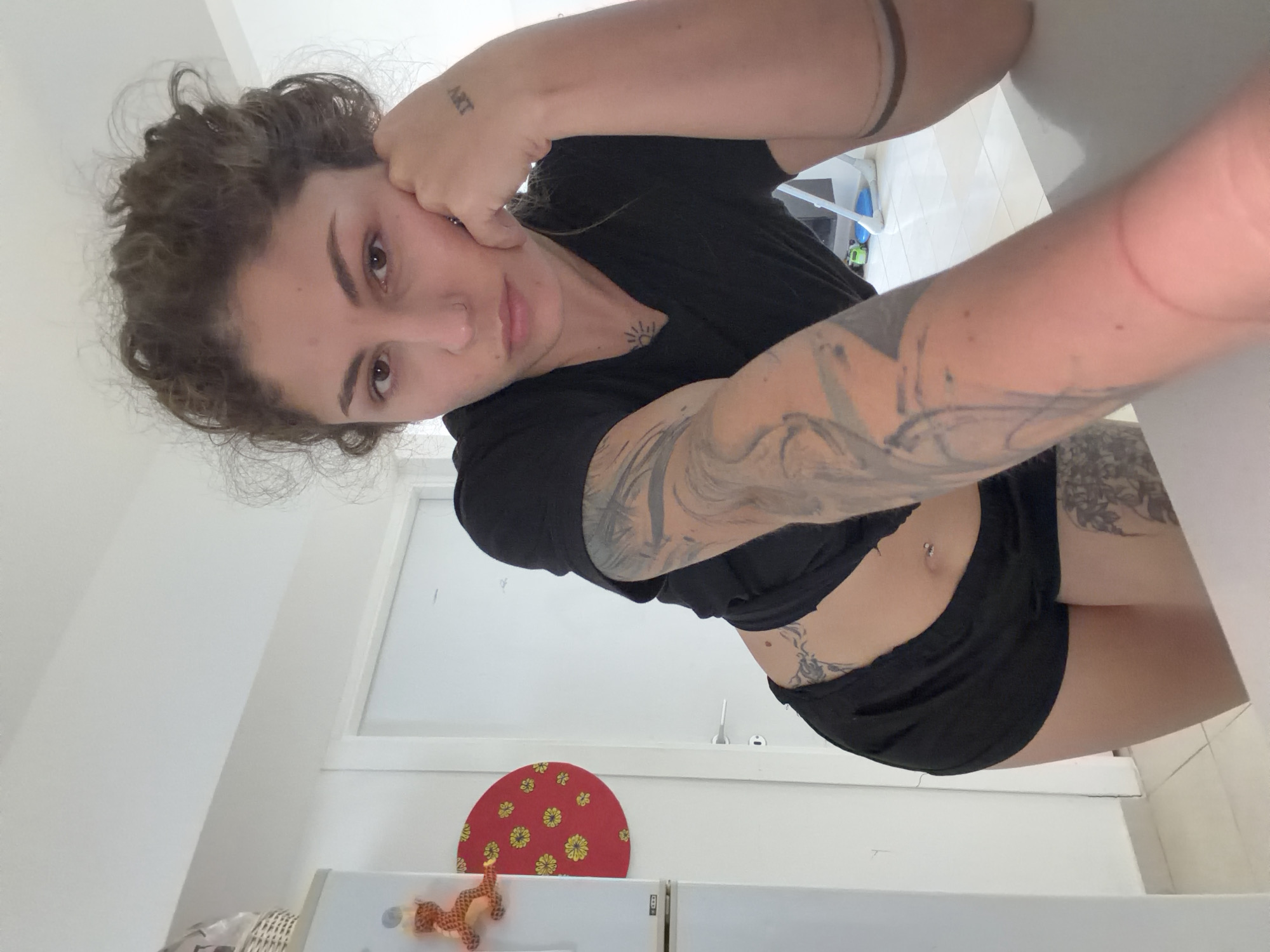 Woman exercises, takes selfies at home in Kiryat Bialik