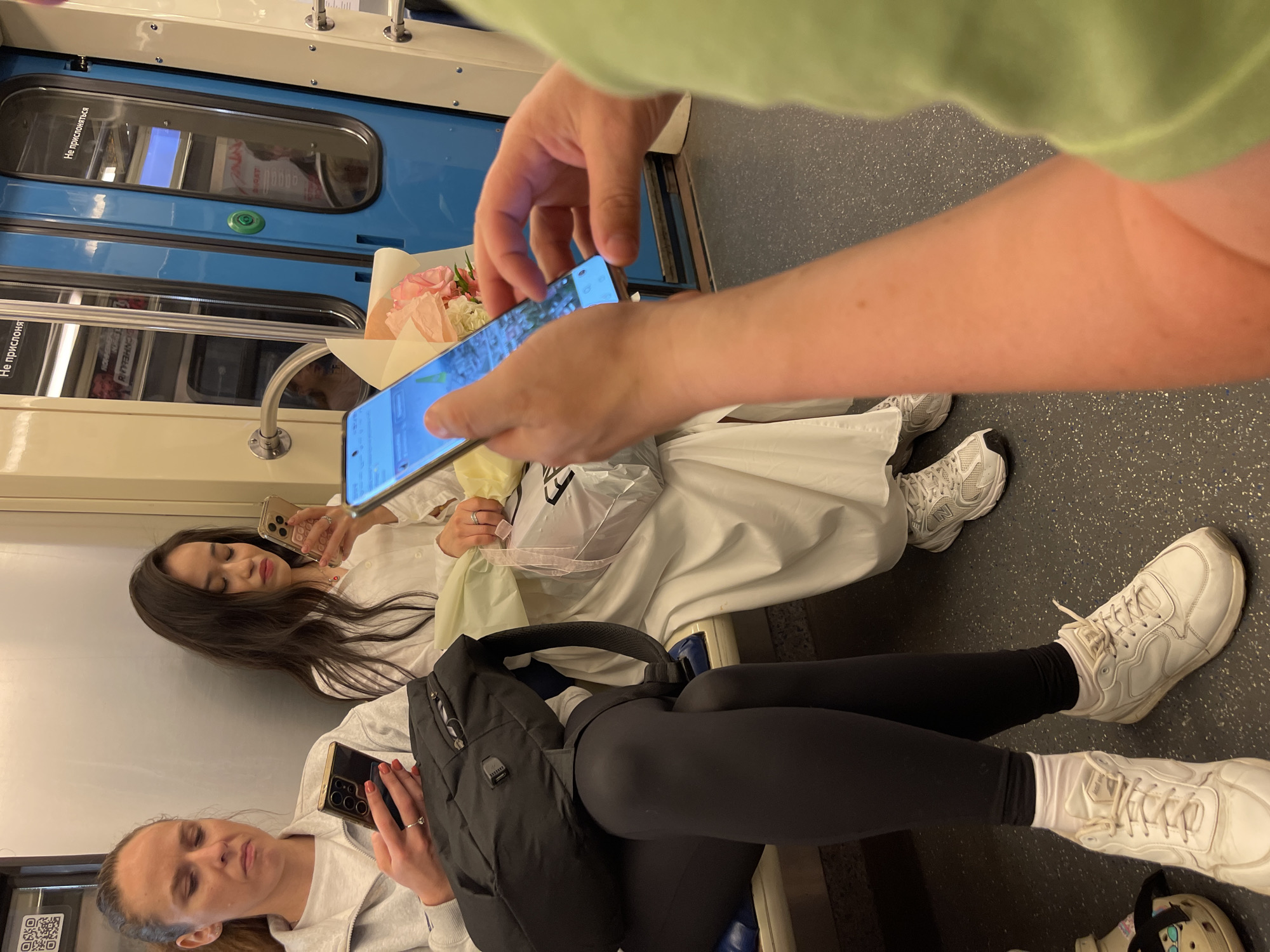 Quiet moment aboard a Moscow metro train