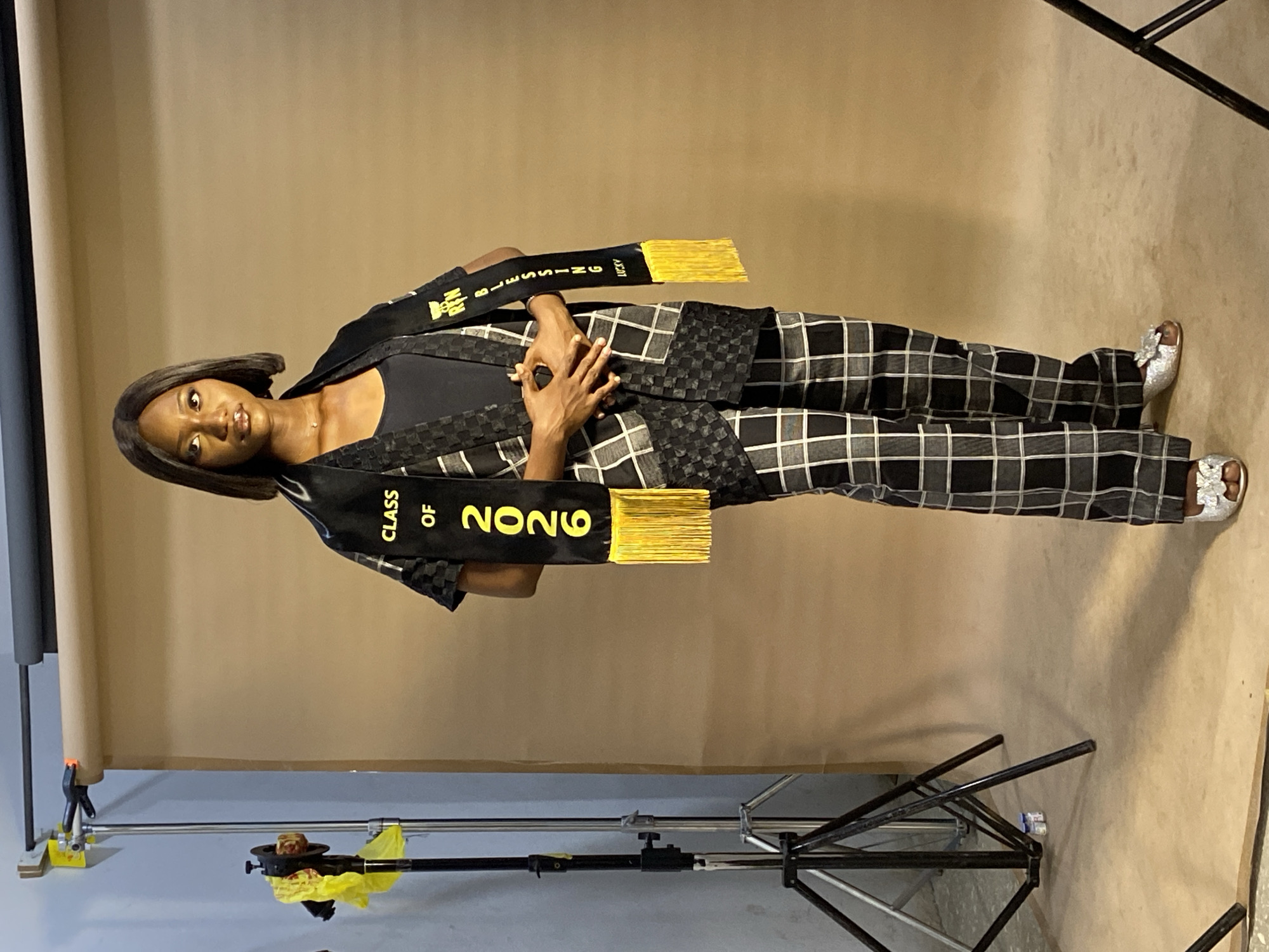 Nursing graduate celebrates with professional photoshoot in Nigeria studio
