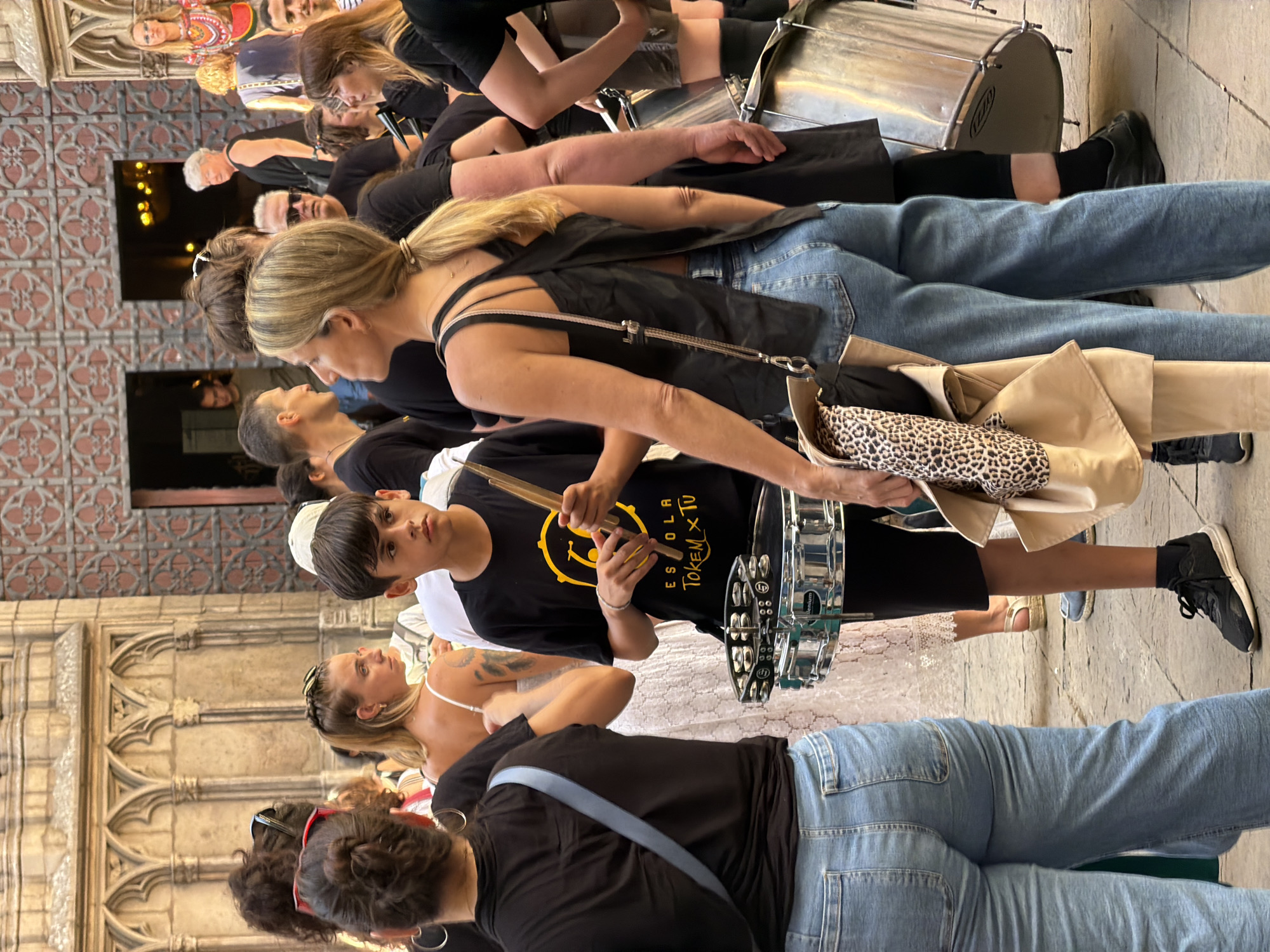 Drumming group performs through Barcelona's Gothic Quarter streets